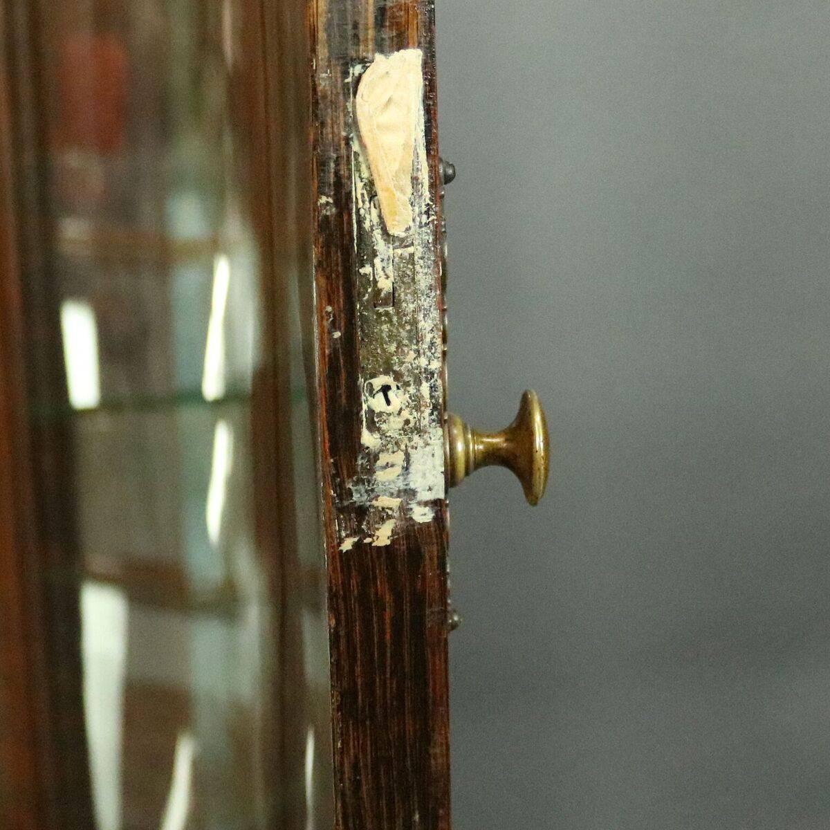 Glass R.J. Horner Bros. Figural Carved Oak Mirror Back China Cabinet, circa 1890