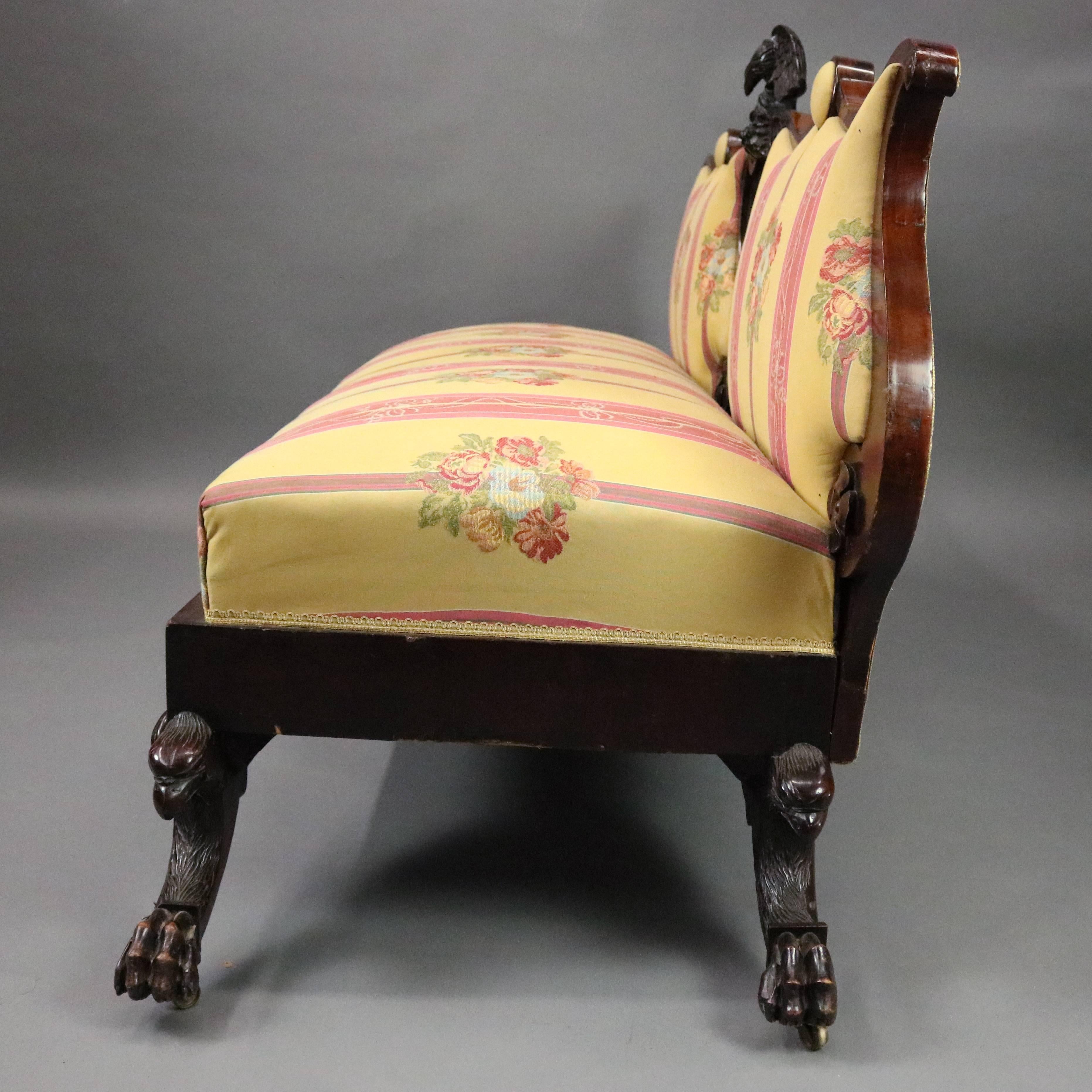 antique sofa with carved eagle
