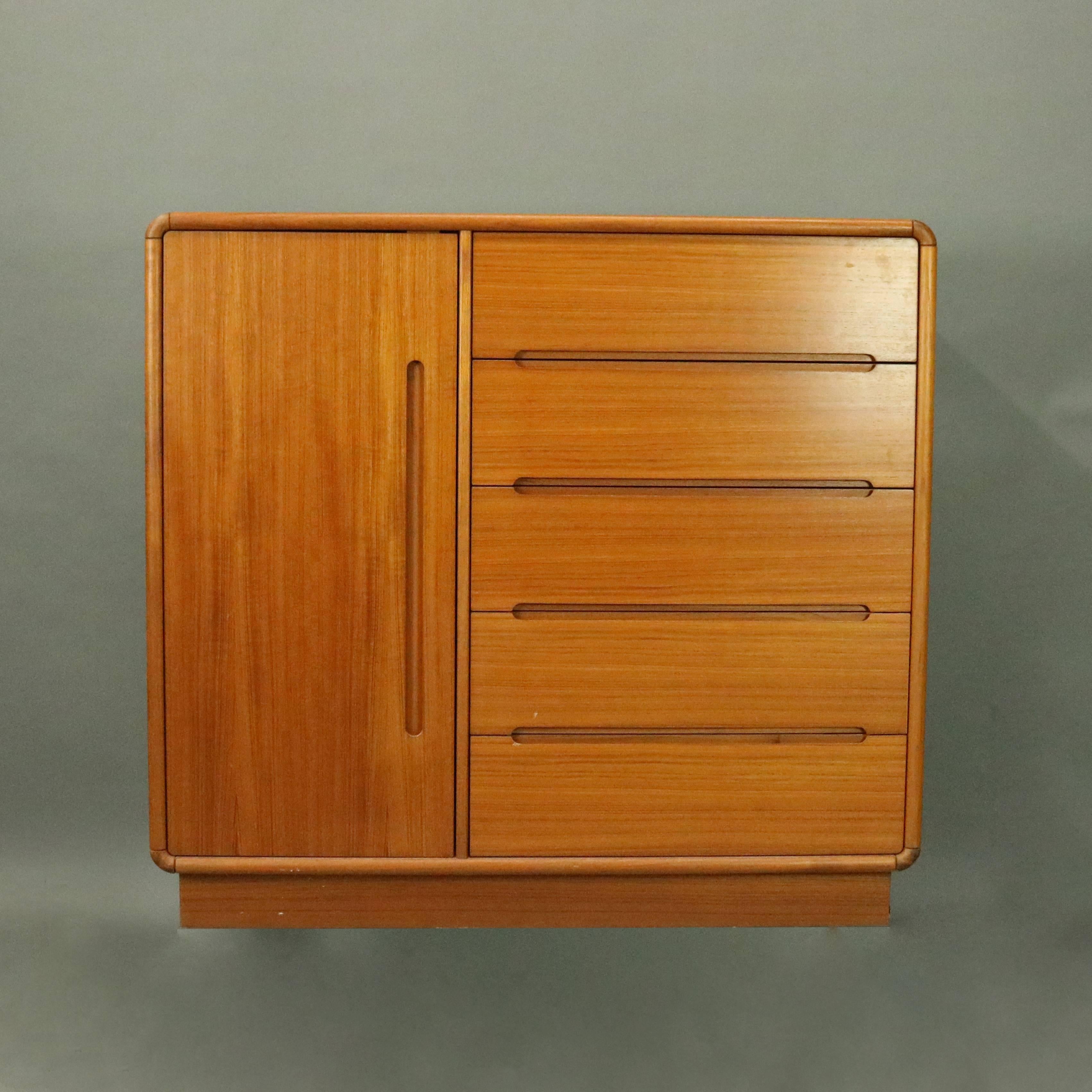 Pair of vintage Mid-Century Danish modern Heywood Wakefield School cabinets feature five outer drawers with side cabinet door revealing shelved interior with upper drawers, en verso label reads Sun Cabinet Co., LTD, Made in Thailand, circa