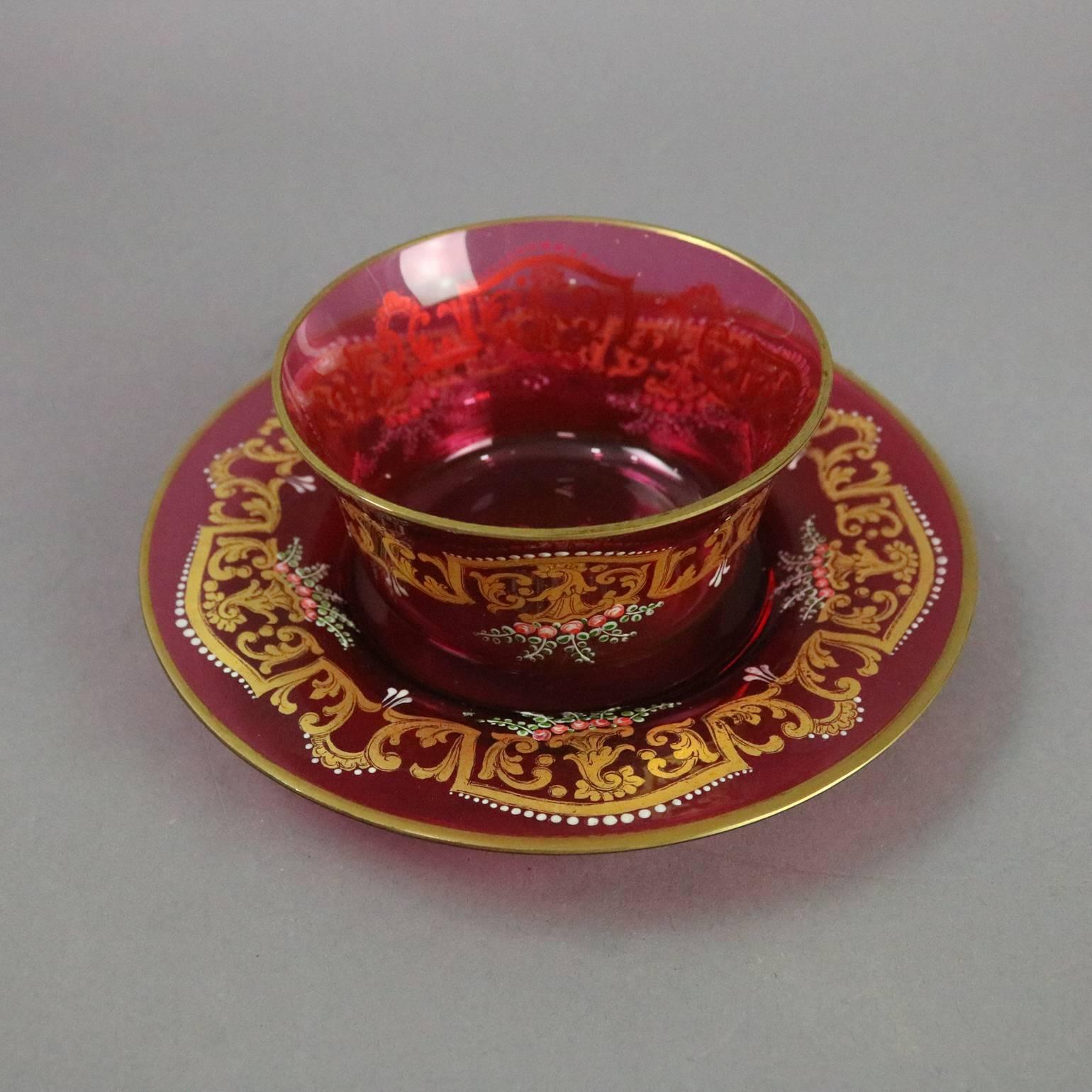 Set of three cranberry Moser glass finger bowls with saucers feature gilt and enameled Baroque graffito decoration, signature on bowls, circa 1850

Measures: 2.75