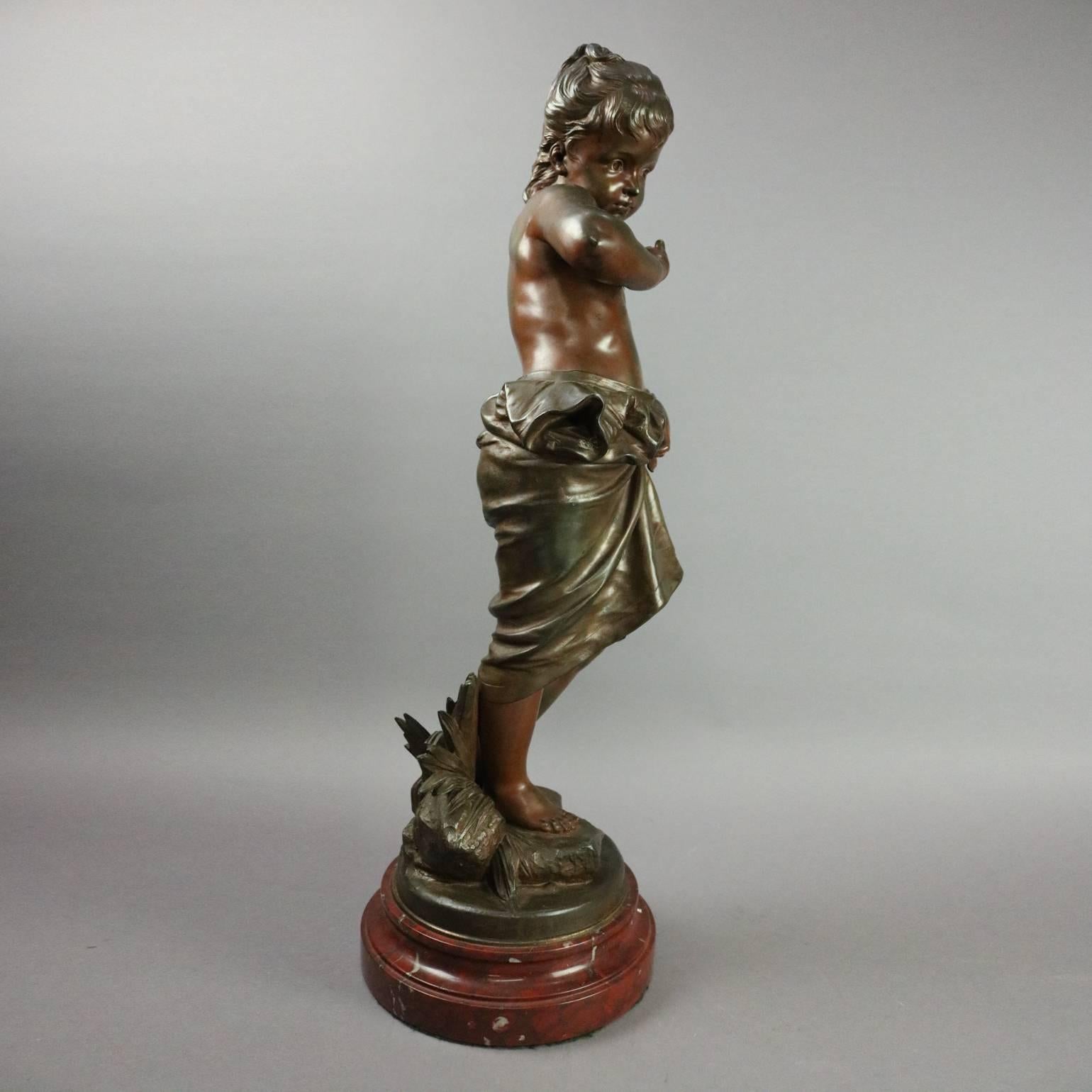 Antique figural bronzed white metal sculpture of young child by listed artist Eutrope Bouret (French, 1833-1906), signed, marble base, circa 1880

Measures - 25" H x 8" W x 7" D

Biography
Eutrope Bouret (16 April 1833 in Paris –