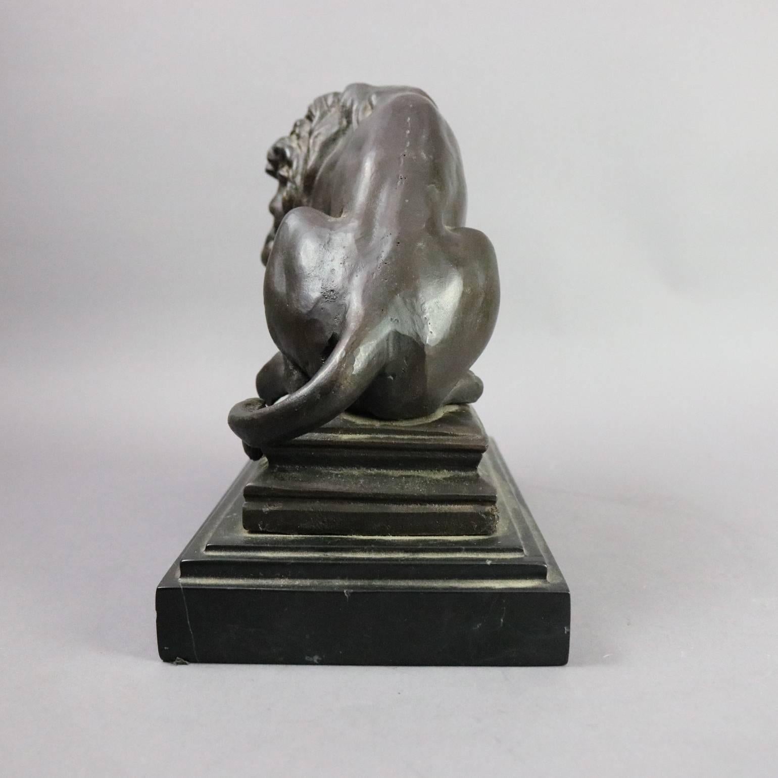 Antique Barye school figural bronze sculpture on marble stepped base depicts hunt scene with lion over his kill (boar), circa 1910

Measures: 10" H x 12" W x 6" D.