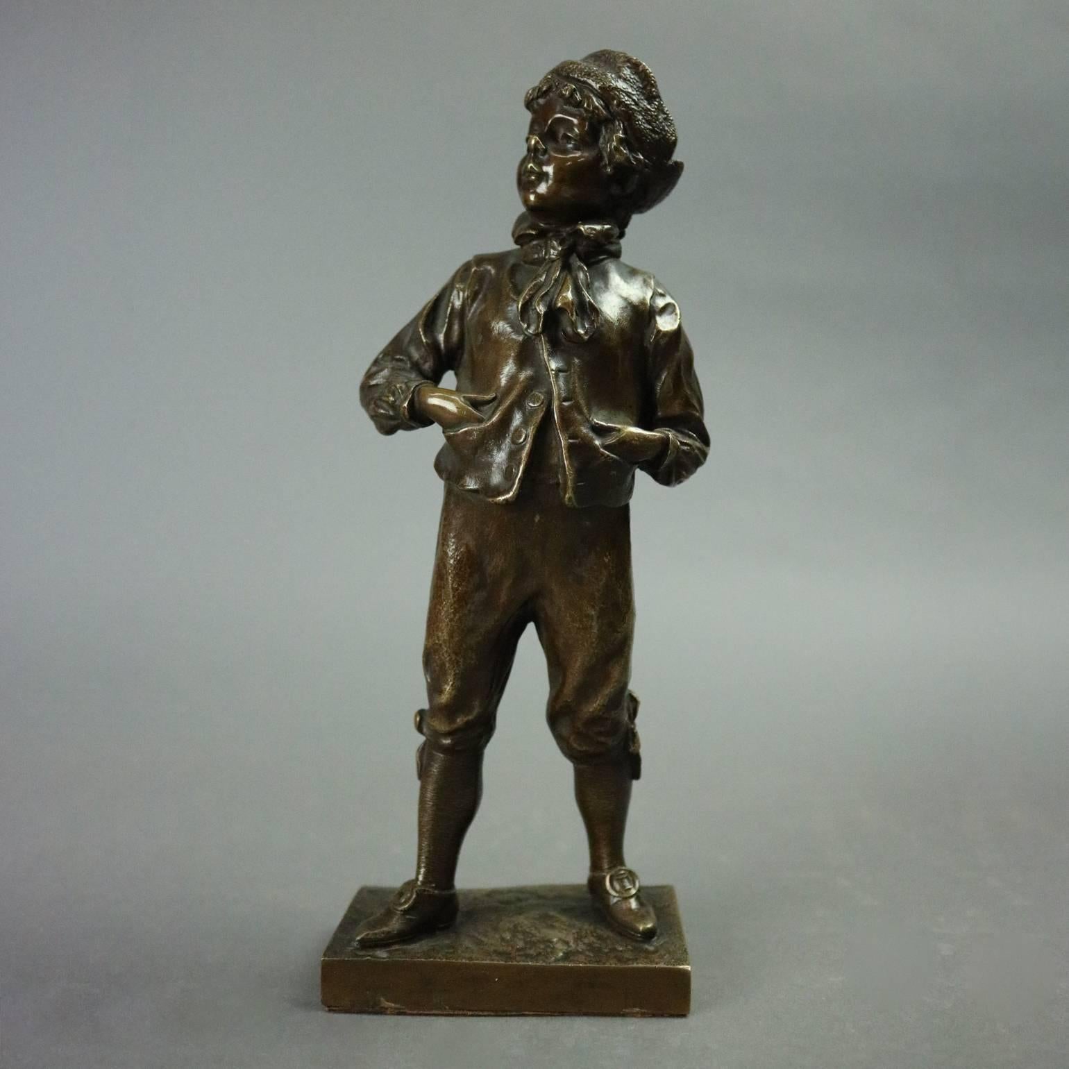 Antique French bronzed metal sculpture of boy with his hands in his pockets signed on base M. Lindenberg (German, 1873-1910), circa 1897

Measures: 8.5" H x 3.25" W x 1.75" D.