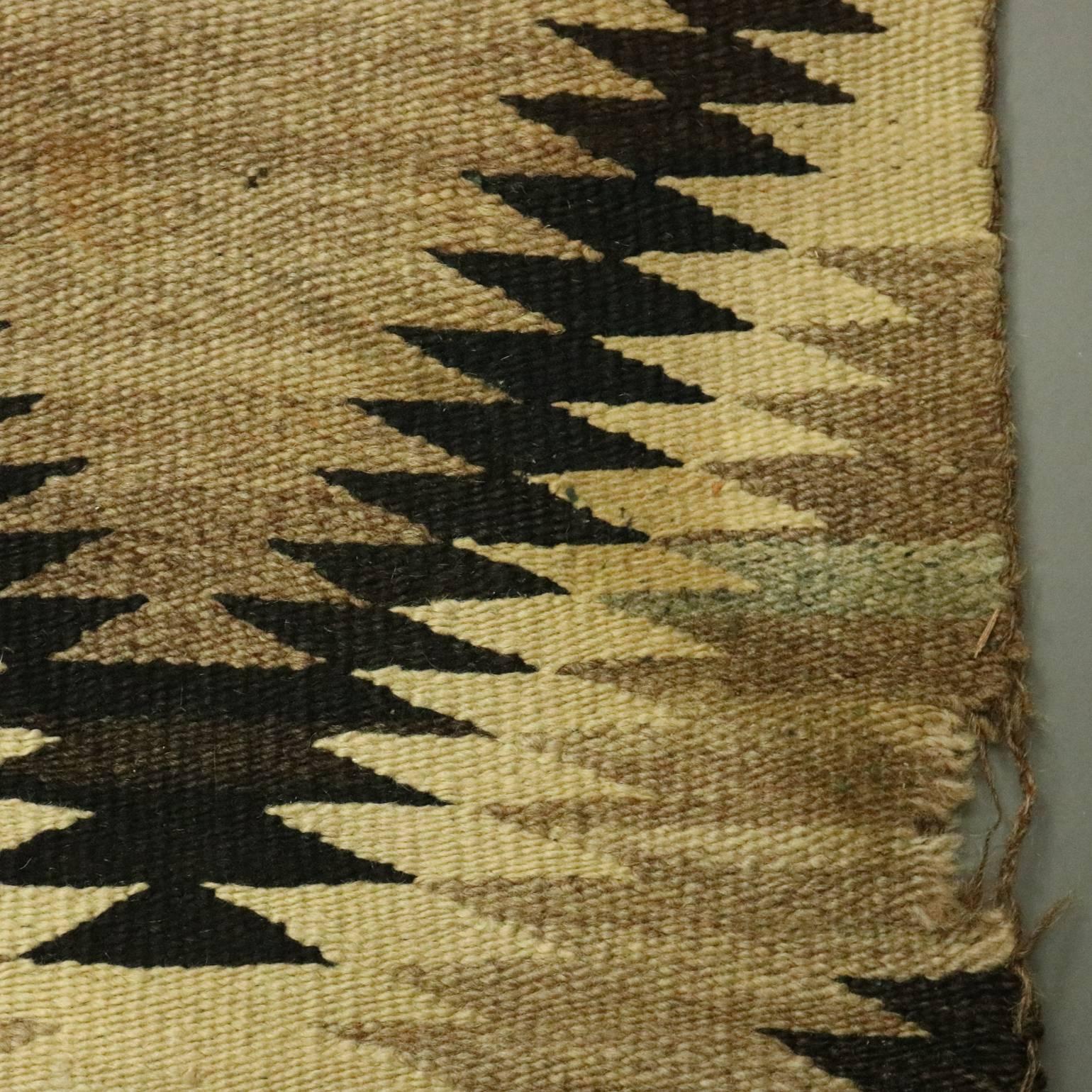Antique handwoven Native American Indian eye dazzler wool rug, circa 1900

Measures: 41" x 28".