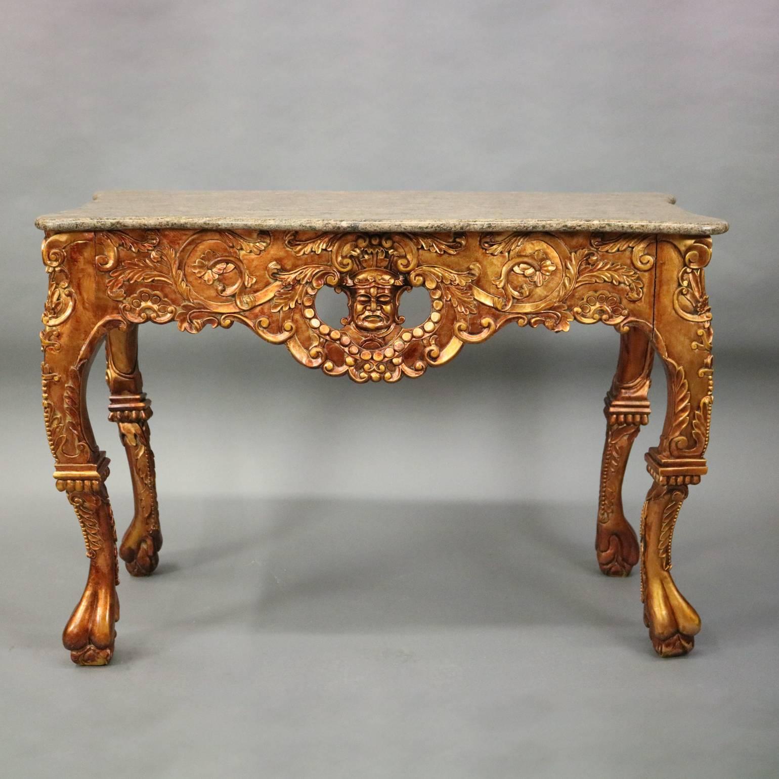 Pair of vintage Asian giltwood marble-top console table feature heavily carved decoration including scrolled acanthus, pierced skirt with central mask and paw feet, circa 1940

Measure: 32