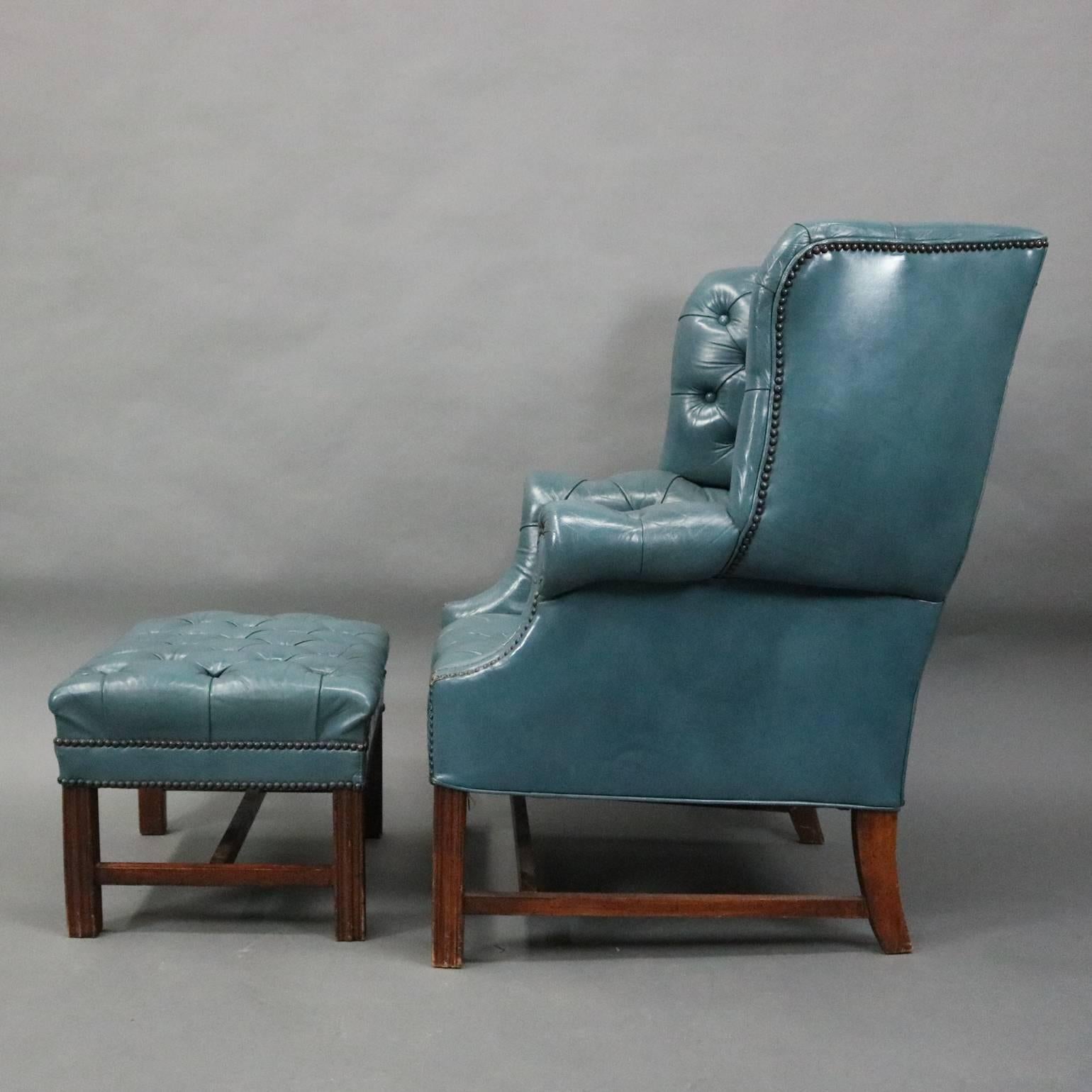 English Hepplewhite Style Leather Chesterfield Wingback Chair and Ottoman, circa 1960