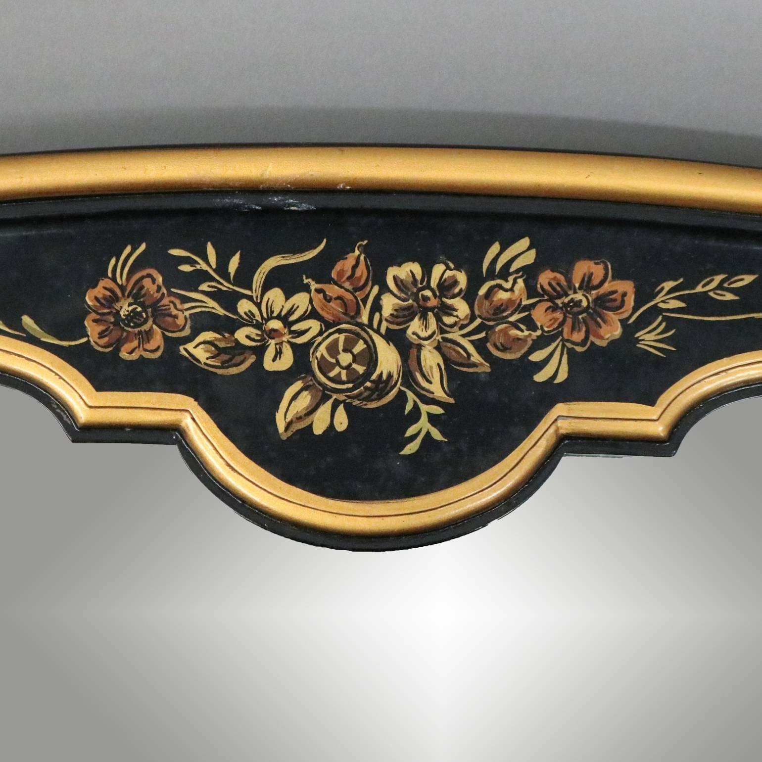 Vintage wall mirror by Drexel Heritage Furnishings Inc features chinoiserie gilt decorated ebonized frame, crest with hand-painted floral decoration, circa 1940.

Measures: 48" H x 24" x 1.5" D, framed; 45" H x 21" W.