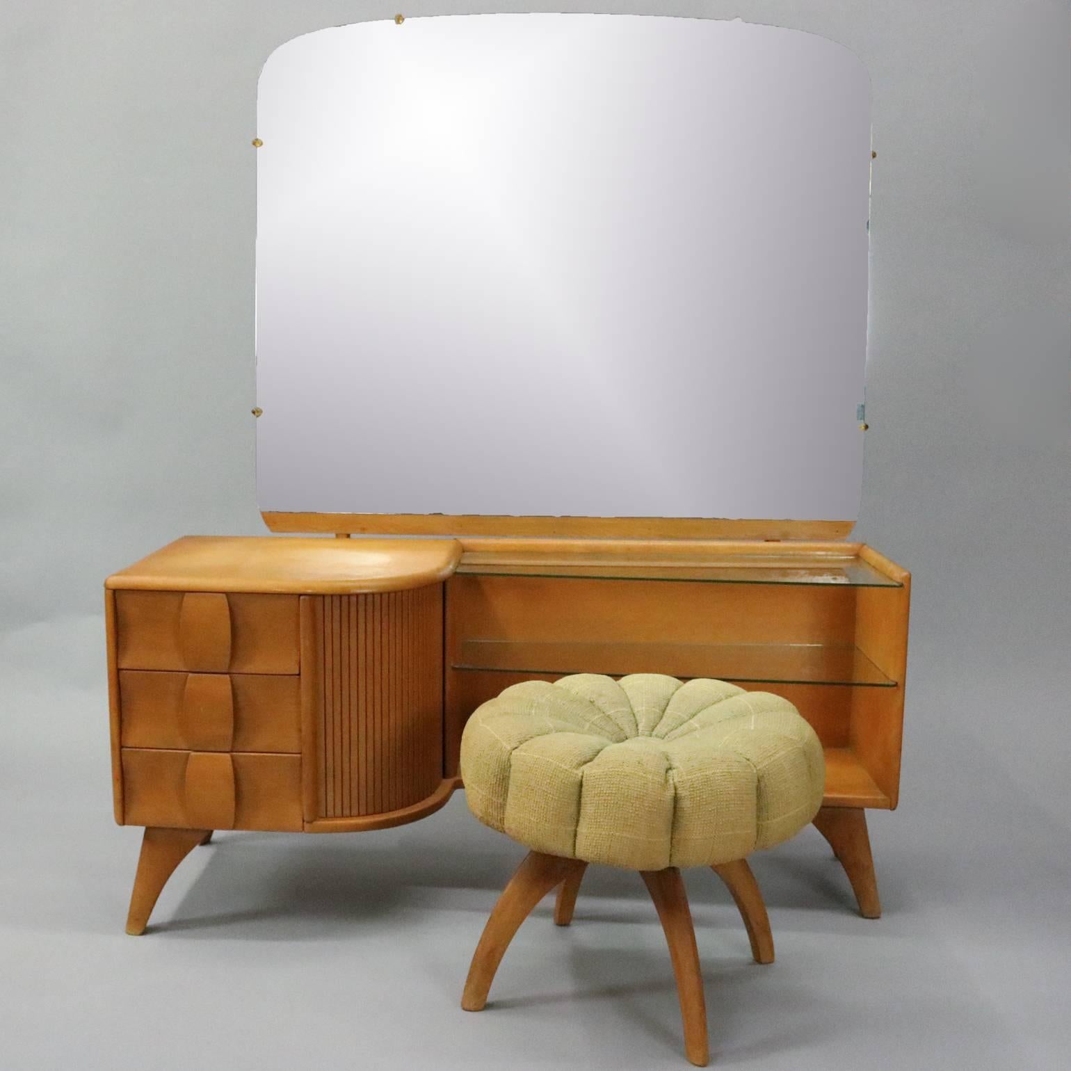 Vintage Heywood-Wakefield Kohinoor mirrored vanity and stool features northern yellow birch wood construction designed by Ernest Herman, circa 1950.

Matching bed, high chest and double dresser listed separately

Measures: 60.5" H x