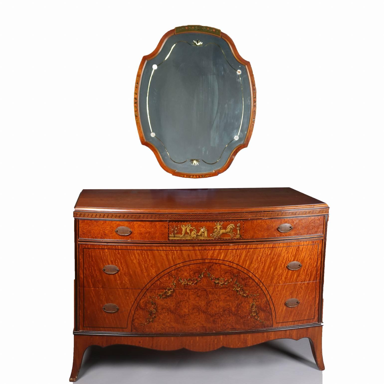 Antique and fine Adam style satinwood mirrored low chest features deep striations throughout with ebonized and inlaid Greek key banding, accenting hand-painted floral sprays and central Classical cherubi scenes, floral etching on mirror, bronze