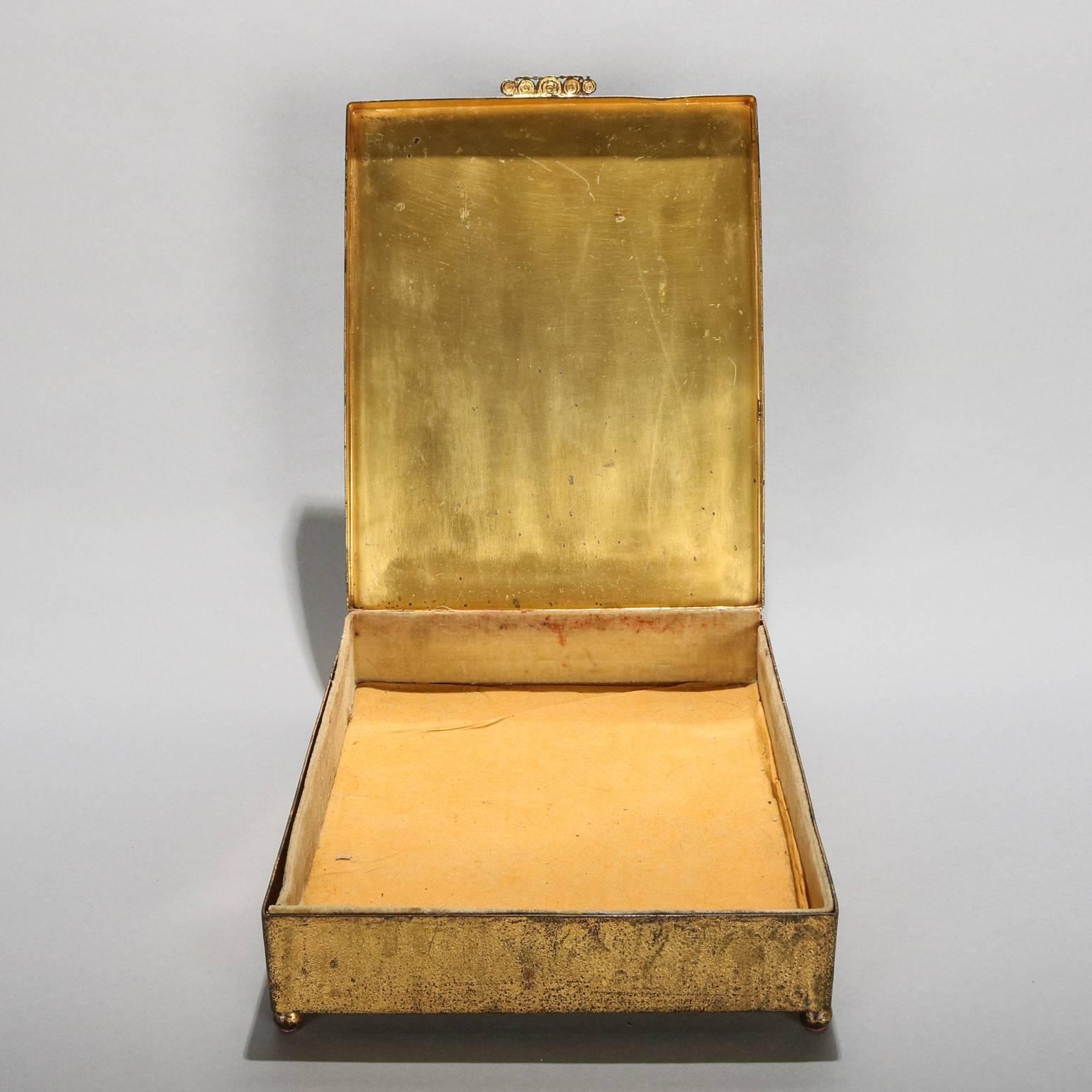 Antique gilt metal footed Bible box by E. & J. B. Empire art gold features cast floral and foliate all-over decoration, jeweled highlights, and central embroidered reserve of the Holy Family (baby Jesus Christ, Mother Mary and David), 19th