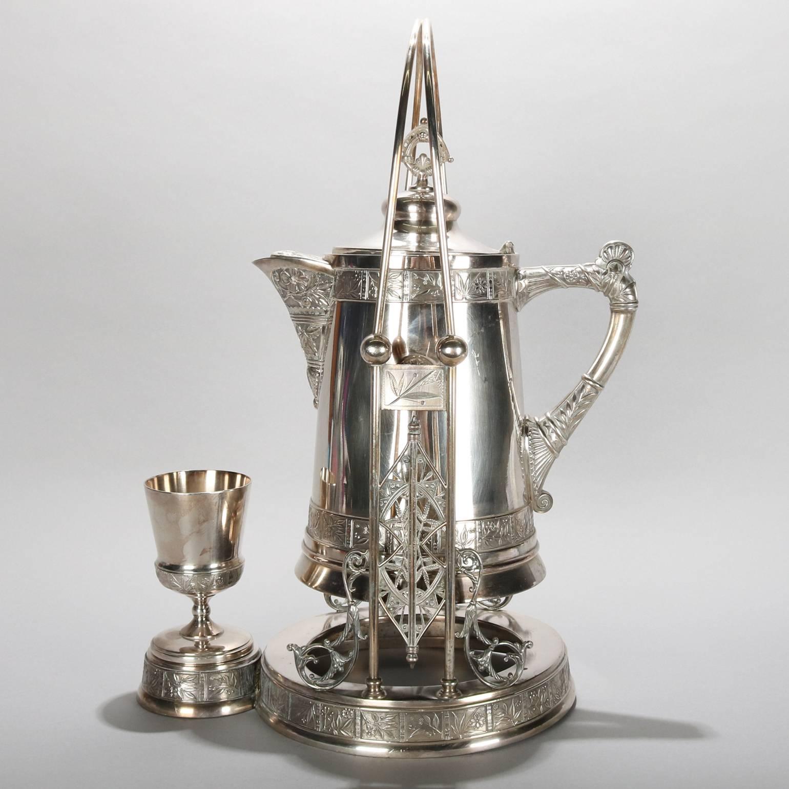 antique silver tilting water pitcher