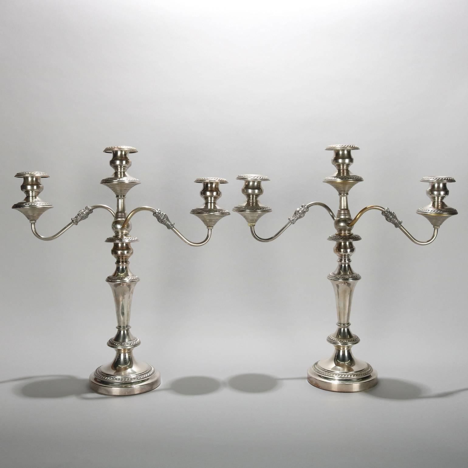 Pair antique English three-light silver plate candelabra by Sheffield feature foliate and beaded decoration, crown stamp on base, circa 1880

Measures: 19" H x 17" W x 5" D.