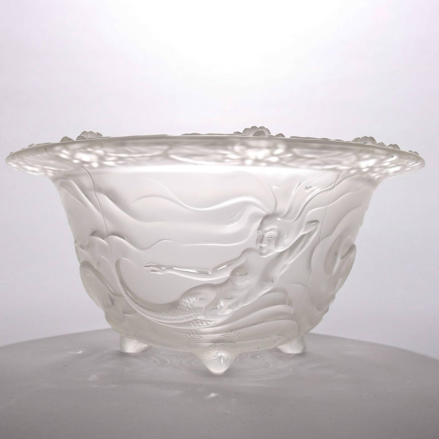 French Art Nouveau frosted crystal footed Lalique school console bowl features in high relief mermaids or sea nymphs with flowers around rim, 20th century

Measures: 6