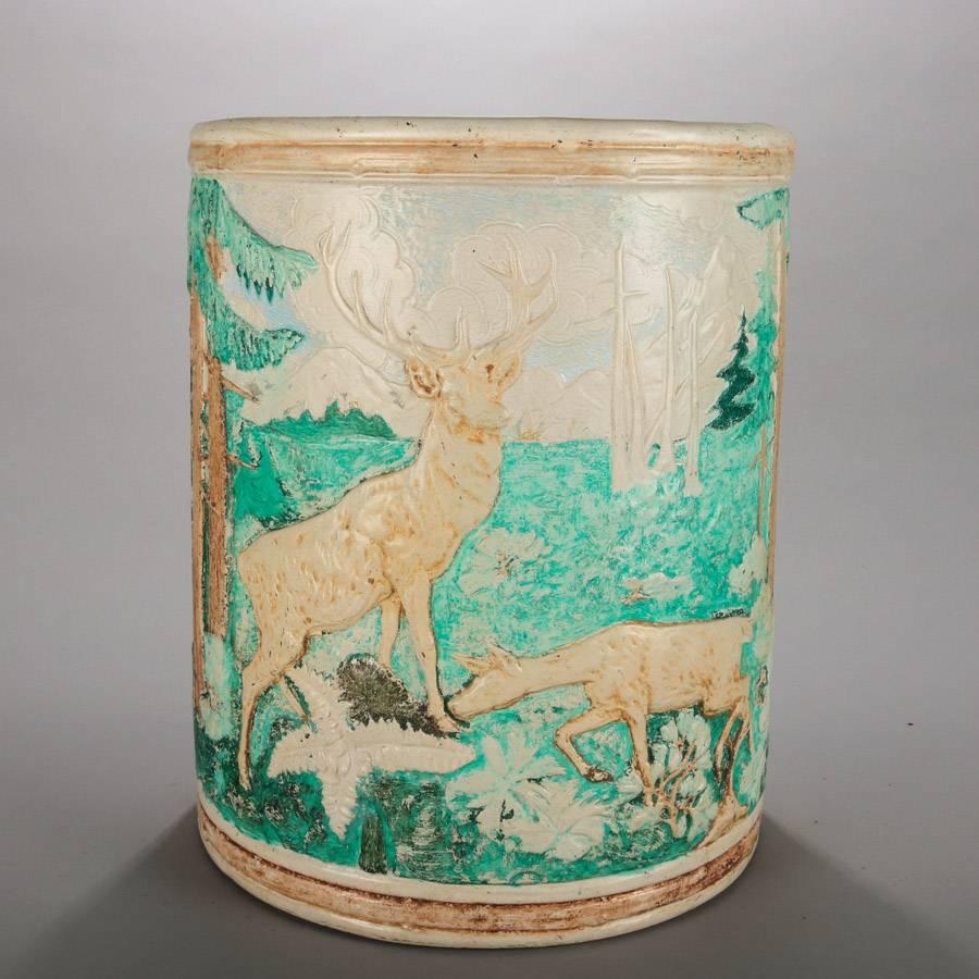 Oversized Weller School Woodland pottery vase features embossed high relief forest scene with creek and deer, 19th century

Measures: 15.5