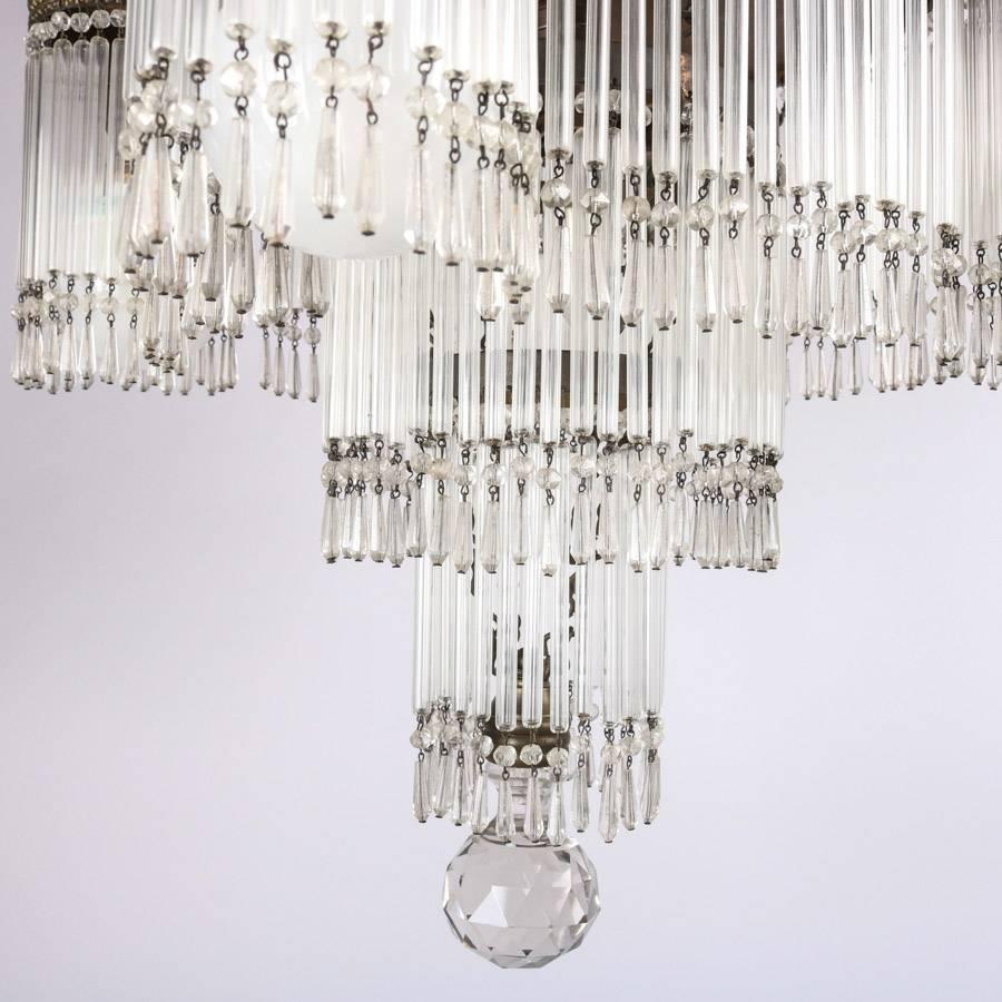 French Antique Art Deco Tiered Crystal and Bronze Five-Light Chandelier, circa 1920