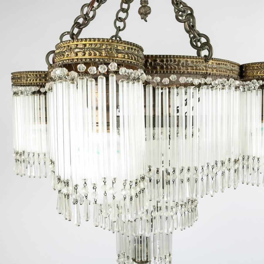 Cast Antique Art Deco Tiered Crystal and Bronze Five-Light Chandelier, circa 1920