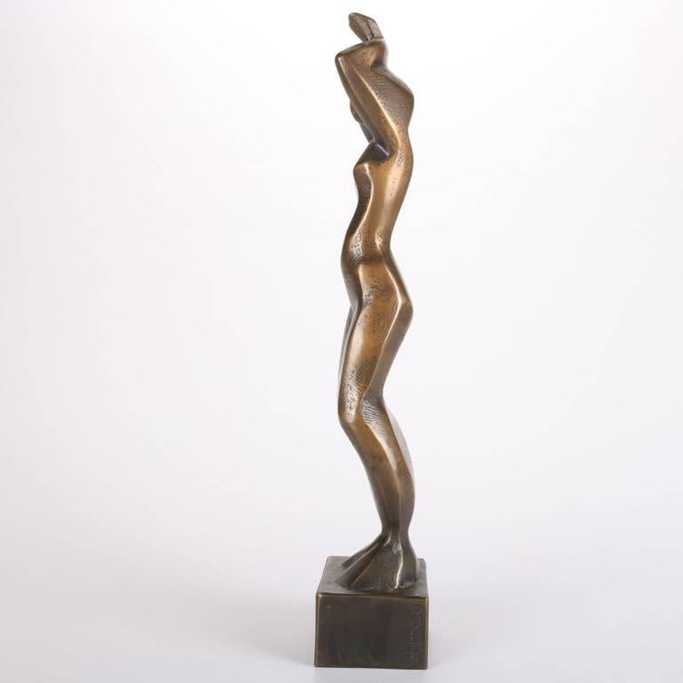 Abstract expressionist bronze sculpture of dancing nude woman by Don Sottile, signed and dated on base

Measures: 15" H X 3" W X 2.5" D

Biography:
Don Sottile in Penn Yan, New York, studied art at State University College at