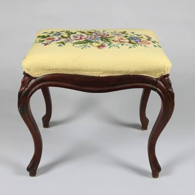 Antique French Louis XVI carved rosewood stool features floral needlepoint upholstered cushion, 19th century

Measures - 21" H x 21" W x 15" D.
