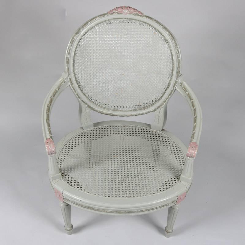 Upholstery Pair of French Louis XVI Style Paint Decorated Caned & Upholstered Armchairs