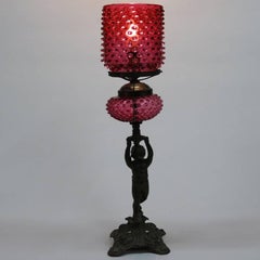 Antique Bronze Cherub Figural Table Lamp with Cranberry Hobnail Shade and Font