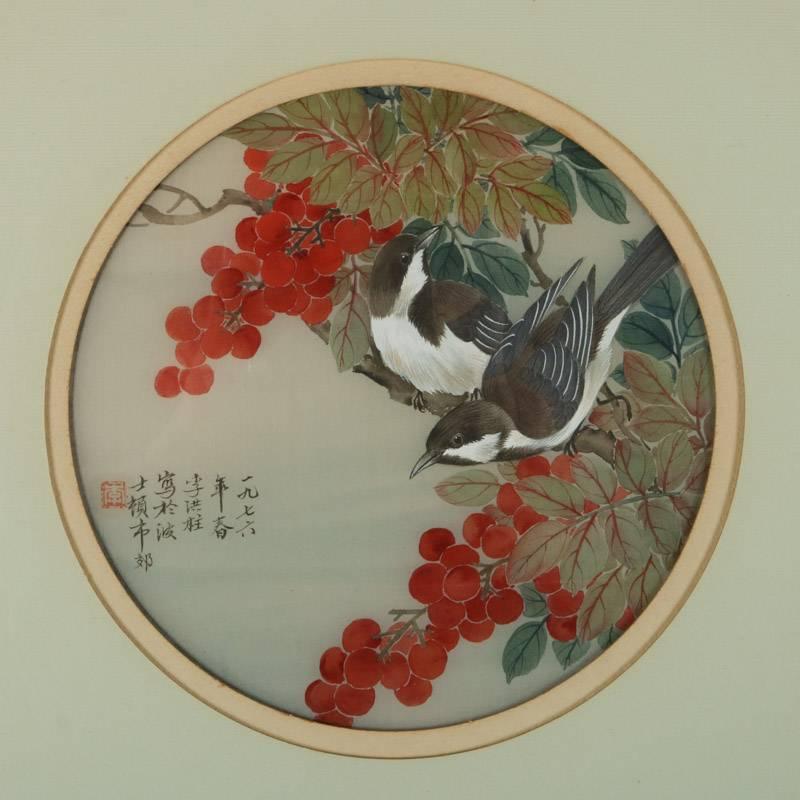 Antique Chinese style watercolor painting features birds among branches and berries, chop mark signed lower left, 20th century

Measures: 15.25" H x 13.25" W x .5" D, framed; 7" diameter, sight.