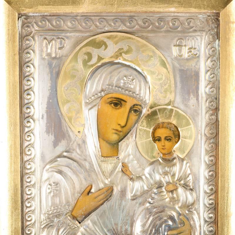 Antique Russian Orthodox high relief painted metal icon of The Mother Mary and The Baby Jesus, signed upper right and left corners, framed, early 20th century

Measures: 10.25" H x 8.25" W x 2" D, framed; 7.75" H x 5.75"