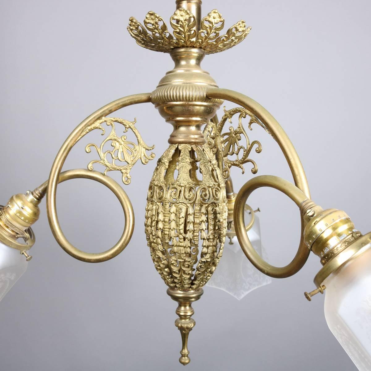 French Three-Light Foliate and Scroll Form Brass Chandelier with Etched Shades