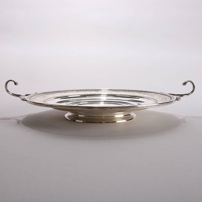 Neoclassical English sterling silver tray by Wedgwood features double scrolled acanthus form handles, incised foliate and floral decorated rim, marked on base "Wedgwood" and "J.S. Co. Sterling", 14.11 toz, 20th century.