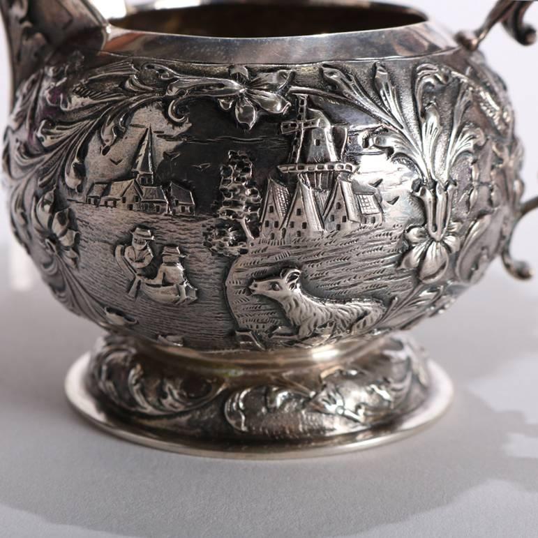 19th Century Four-Piece Antique Dutch .800 Silver Repousse Figural and Scenic Tea Set