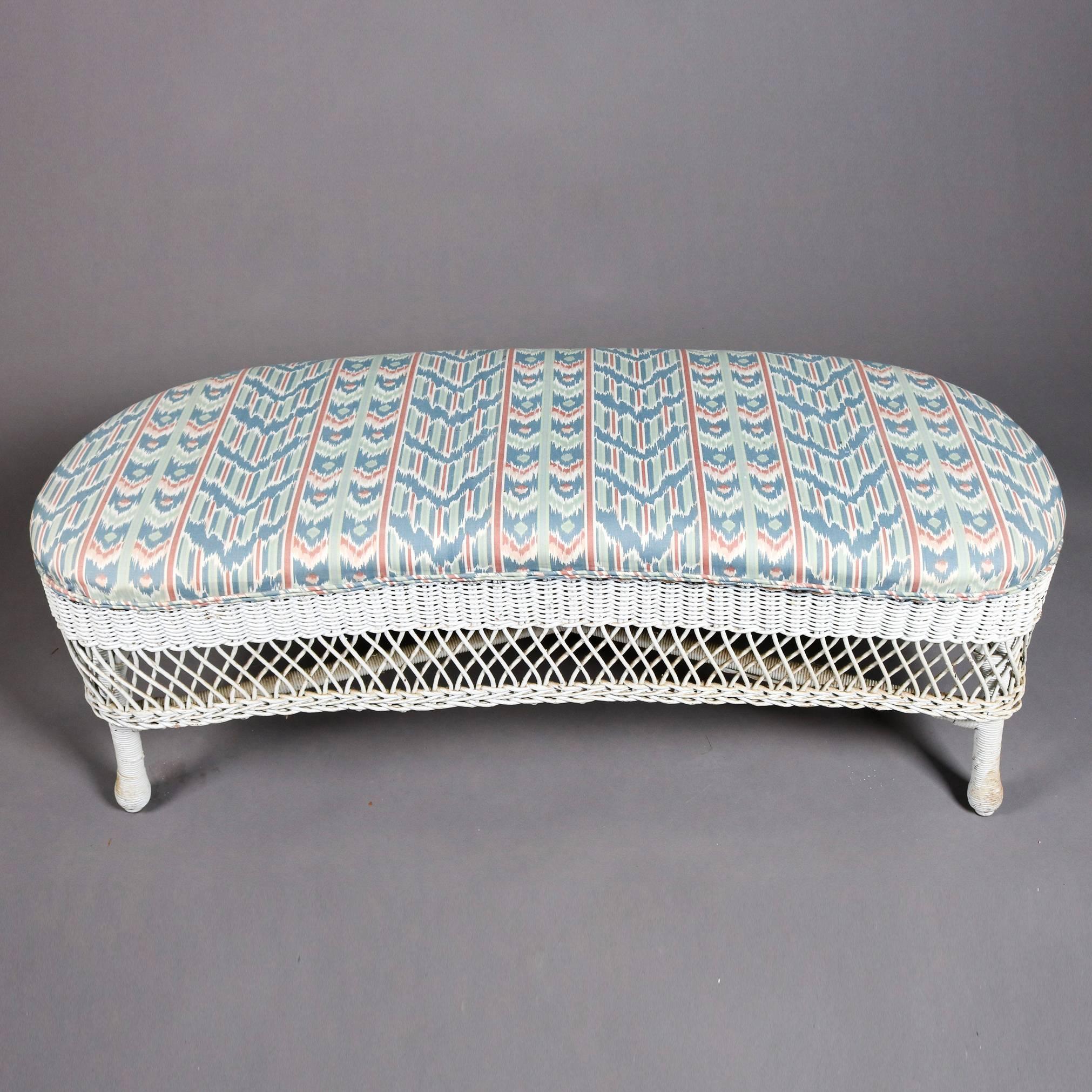 Pair of Heywood Wakefield School white wicker upholstered kidney form benches with upholstered seats, 20th century

Measures: 17