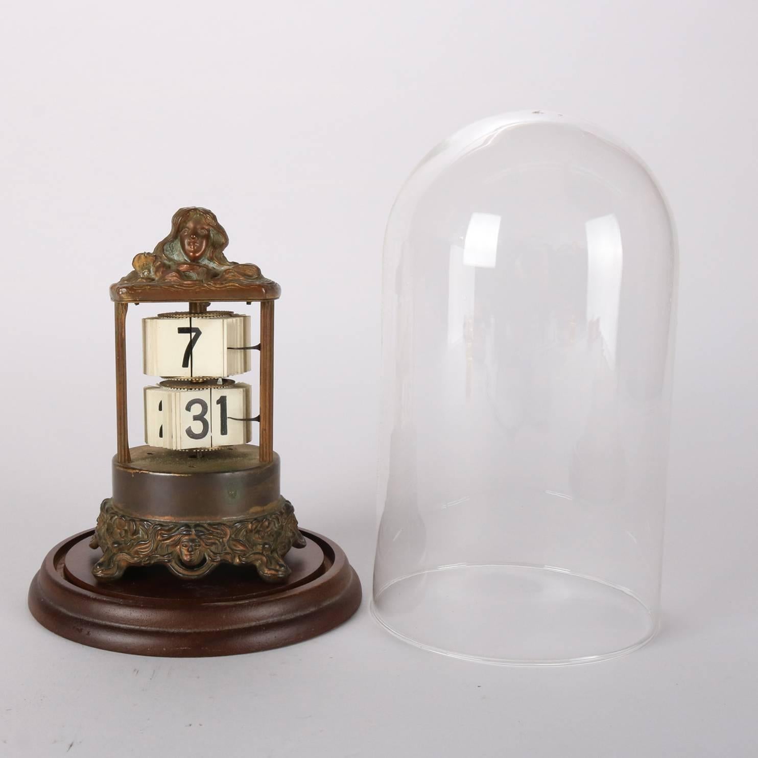 Antique Art Nouveau figural Plato flip ticket desk clock features bronzed frame with female bust finial and seated on pierced foliate base with four feet, housed in dome, decorative piece (see condition), early 20th century.

Measures - 9"H x