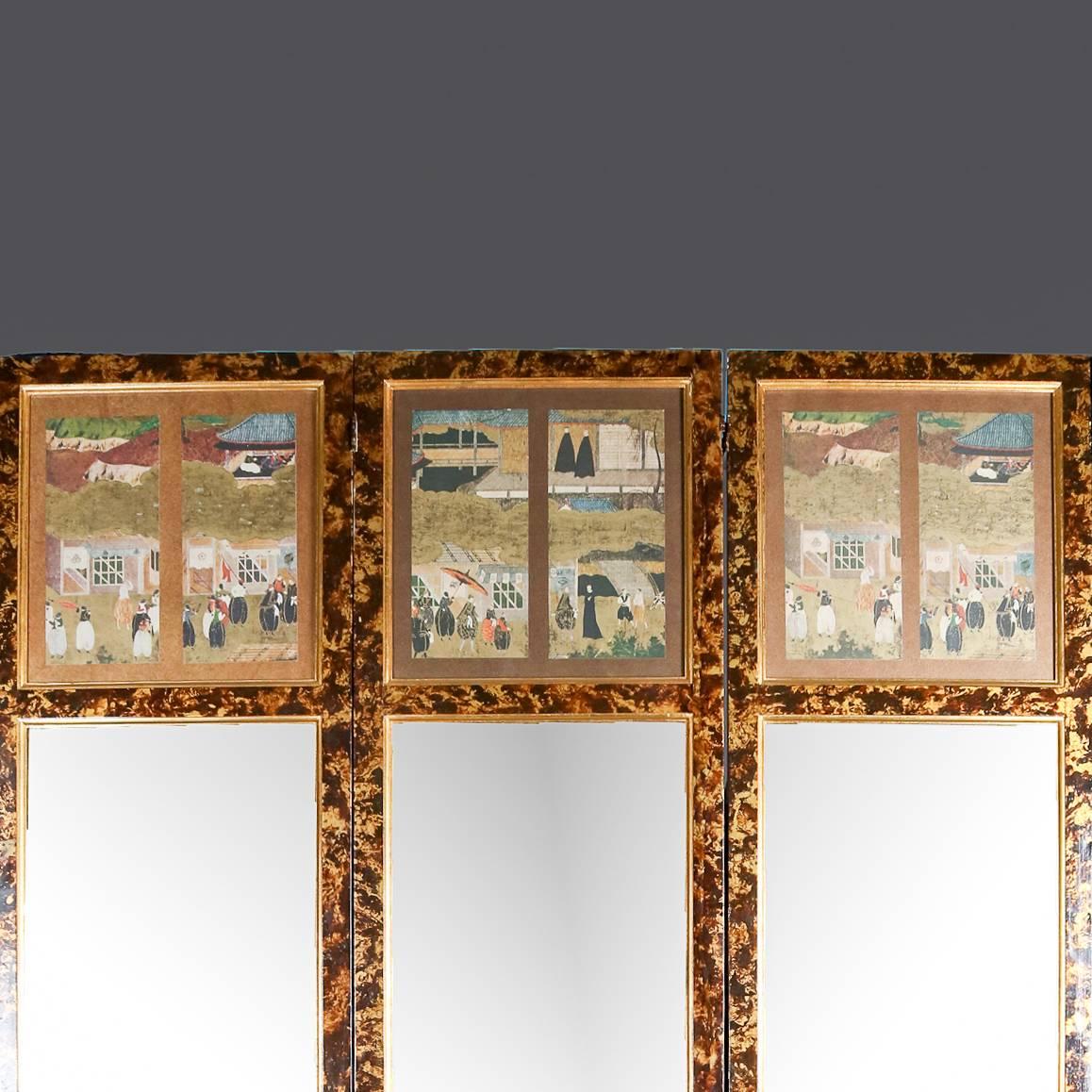 Asian Hollywood Regency style dressing screen features faux tortoise shell lacquer finish with three panels, each with trumeau style mirror with village scene, 20th century.

Measures: 89