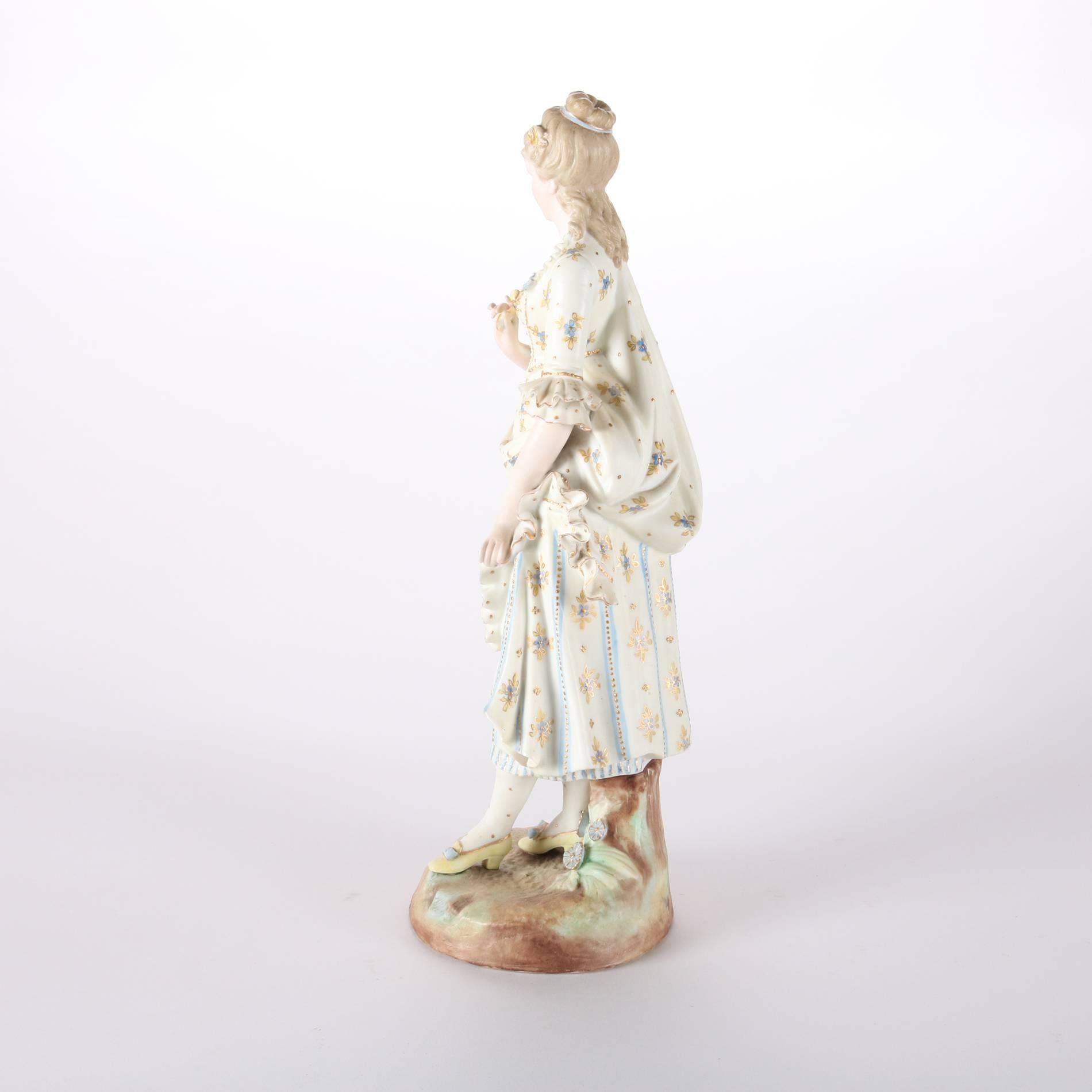 Antique large English porcelain figurine features hand-painted female in floral dress and highlighted in gilt, signed on base, 19th century

Measures - 16.25