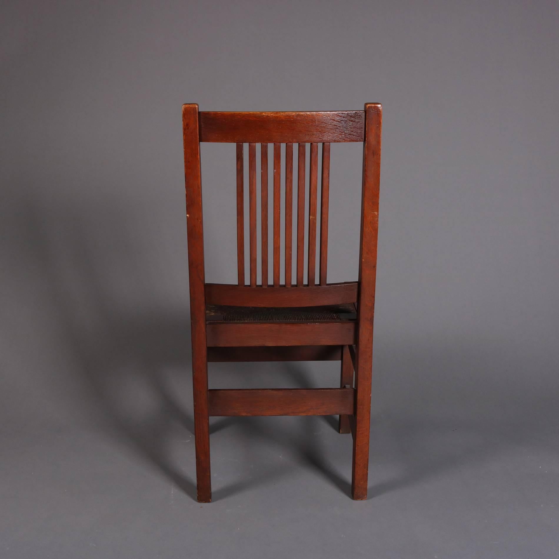 Four Arts & Crafts Mission Oak L. & J.G. Stickley Spindle Chairs, 20th Century In Good Condition In Big Flats, NY