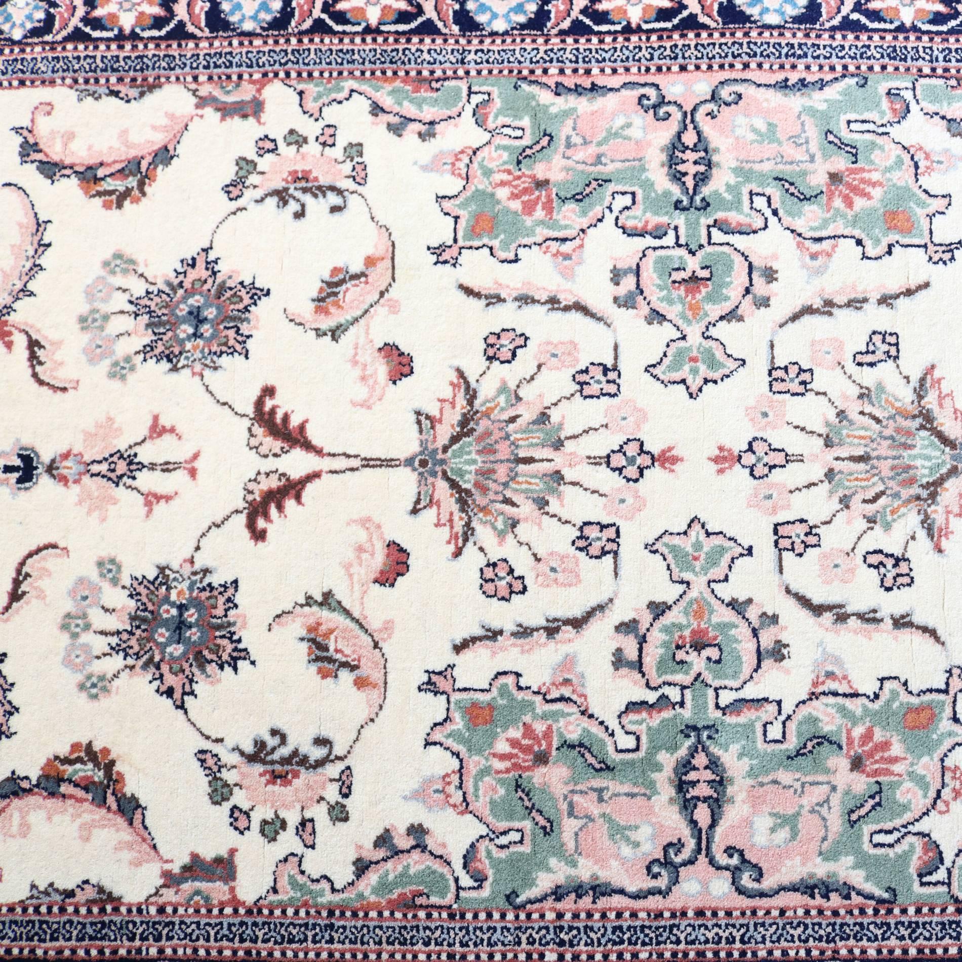 Vintage Isfahan Persian oriental runner features detached floral and foliate spray on ivory ground, tag reads "hand-knotted in Pakistan", 20th century

Measures - 27" x 189".