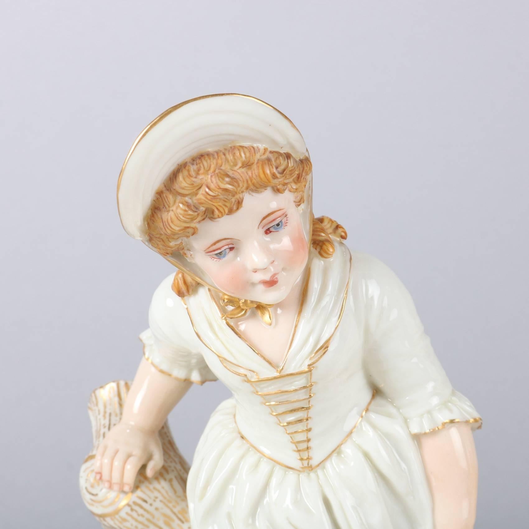 Pair of antique English figural Royal Worcester hand-painted and gilt candy or bon bon dishes by James Hadley feature young girl and boy, embossed "Hadley" incised on side of base, blue maker mark on underside, reminiscent of Royal