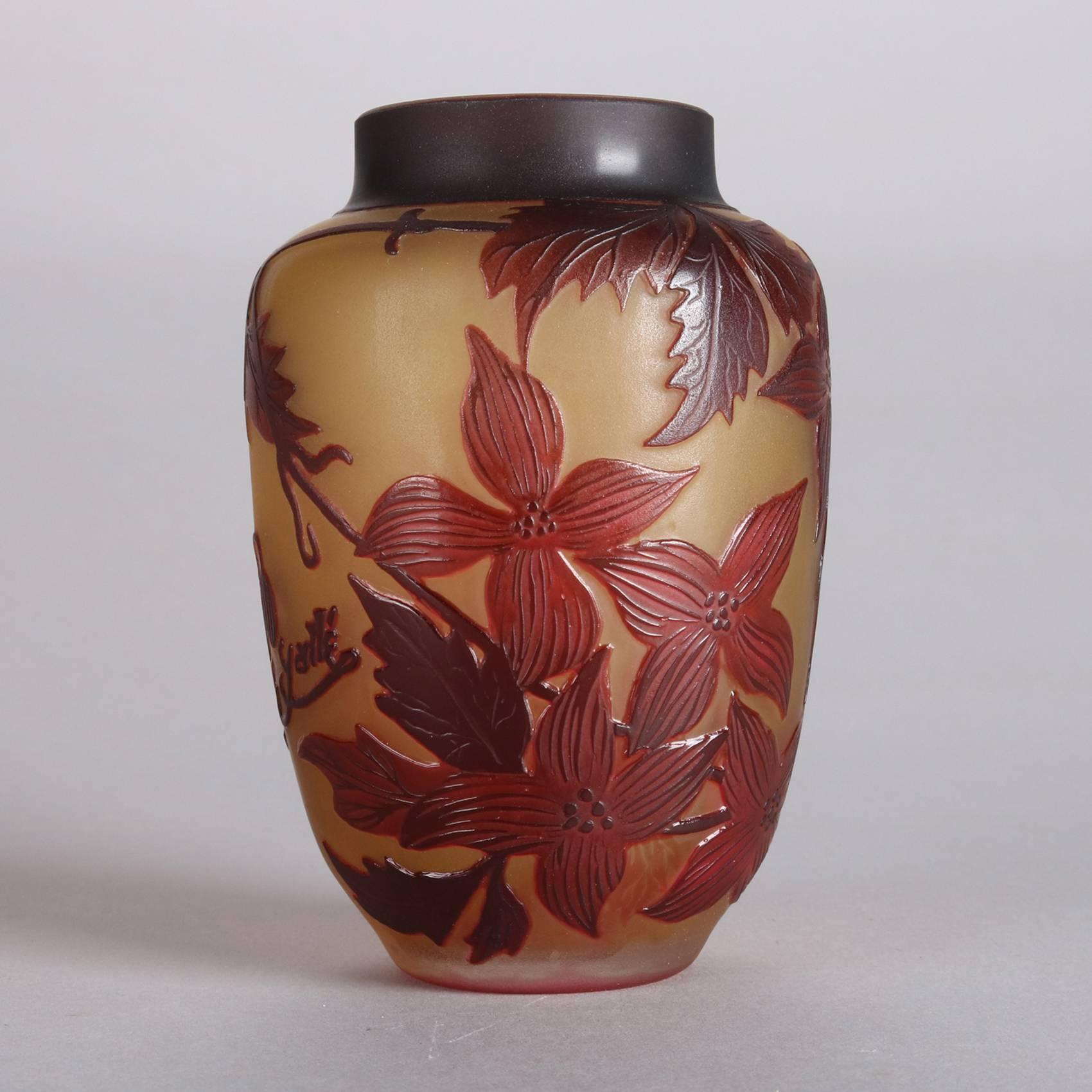 Art Nouveau French cameo cabinet vase by Galle features cut back clematis floral design, signed Galle, 20th century.

Measures: 5
