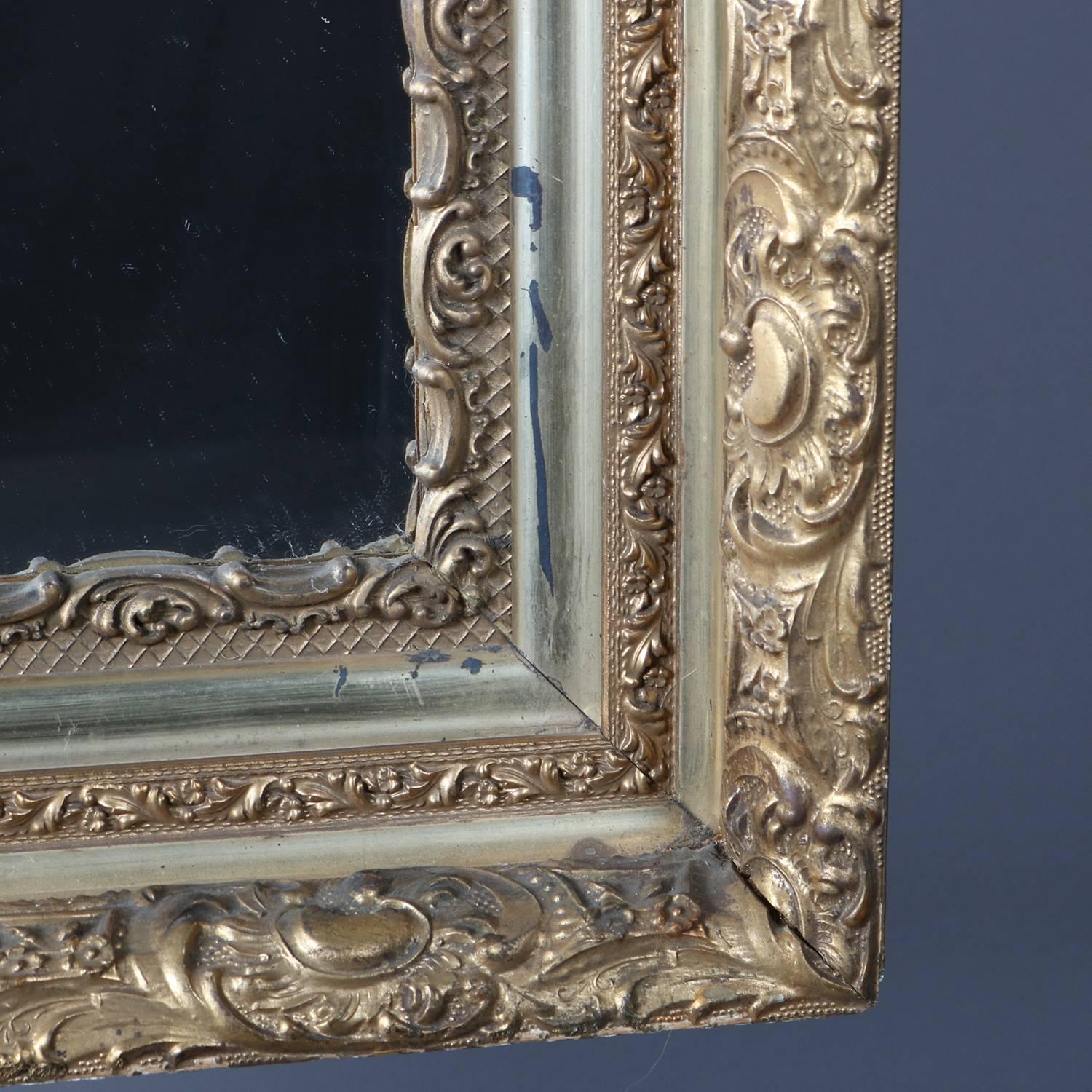 Antique Scroll and Foliate Form Deep Gold Giltwood Wall Mirror, 19th Century In Good Condition For Sale In Big Flats, NY