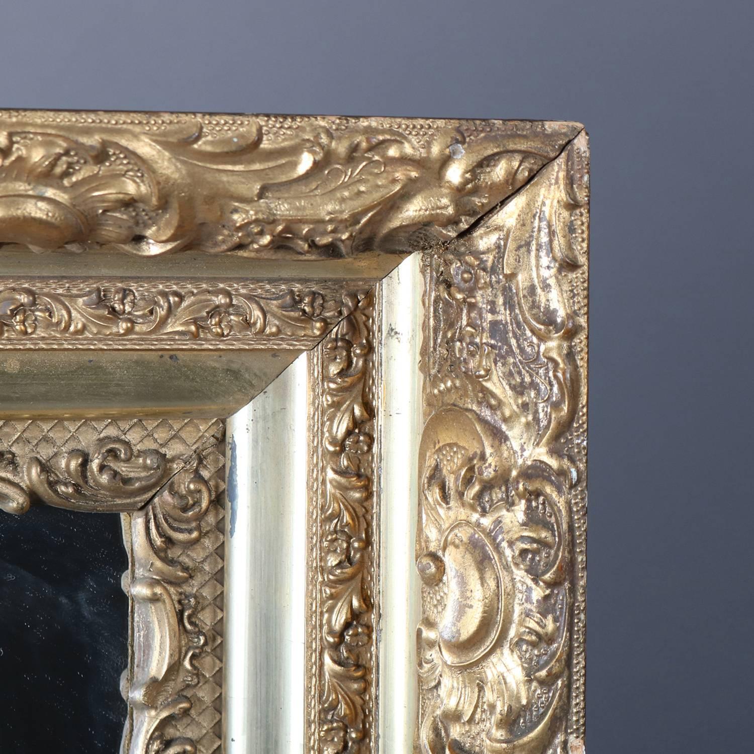 20th Century Antique Scroll and Foliate Form Deep Gold Giltwood Wall Mirror, 19th Century For Sale