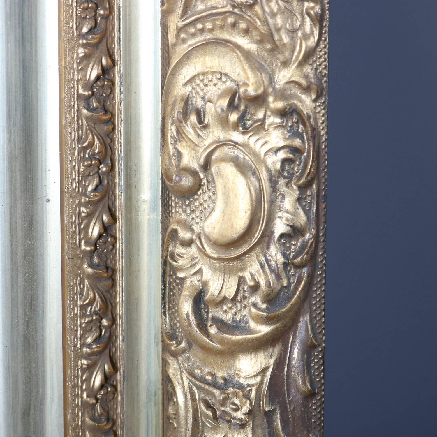 Antiguo espejo de pared de madera dorada con forma de volutas y follaje, Siglo XIX Espejo en venta