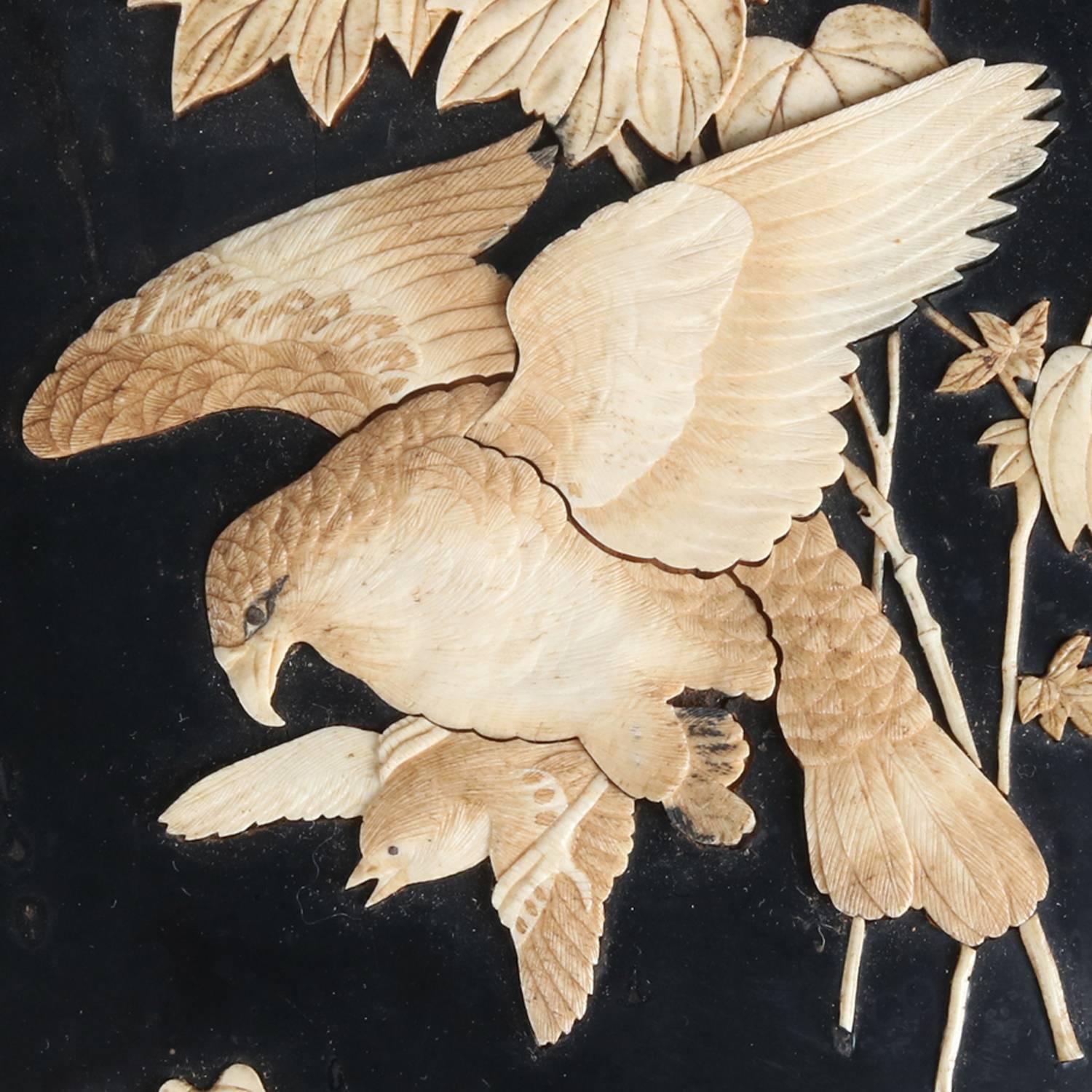 Hand-Carved Japanese Ebonized Plaque with Carved Bone Inlay, Falcon Hunt Scene, 20th Century