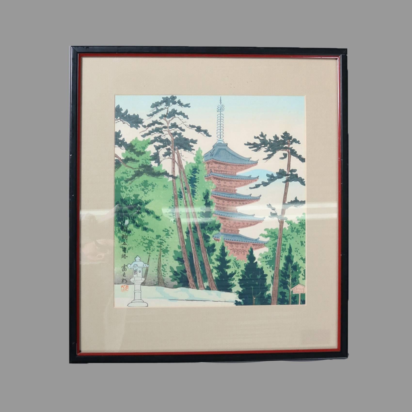 Set of four Japanese hand-painted watercolored wood block prints by Tomikichiro Tokuriki depict village and countryside scenes with pagodas and other structures, chop mark and stamp signed, 20th century

Measures - fr: 15.75" h x 14" w x