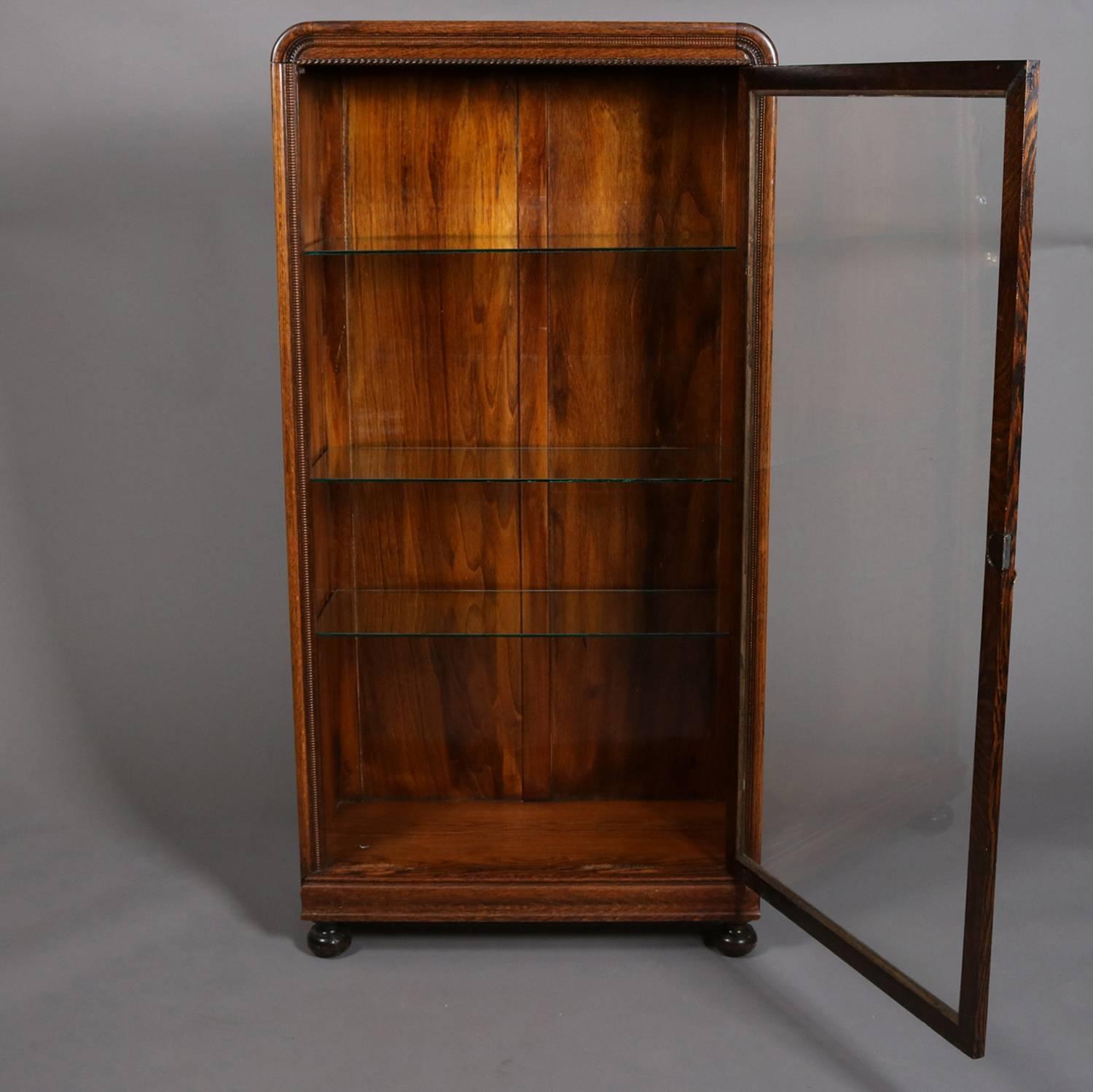 antique oak cabinet with glass doors