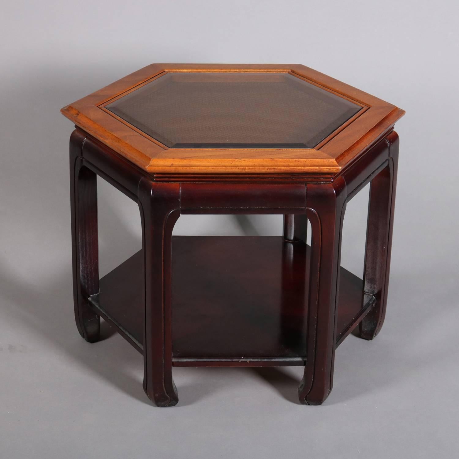 Antique Chinese style hexagonal coffee table features mahogany base with glass covered caned top, 20th century

*Matching coffee table listed separately*

Measures - 21