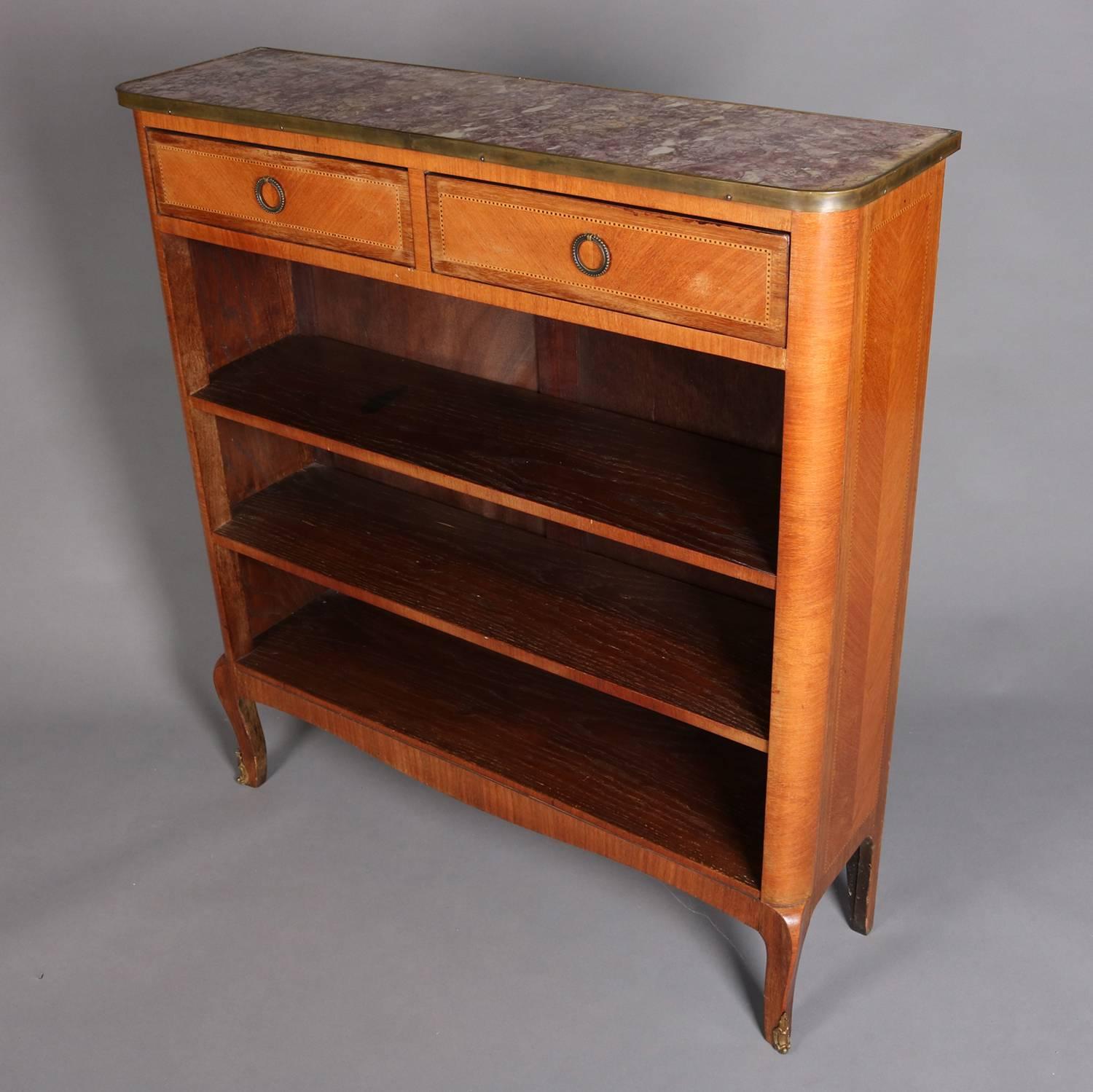 Vintage French mahogany open bookcase features inlaid banding, two drawers and three shelves, marble top, and seated on cabriole legs, 20th century

Measures - 38.5