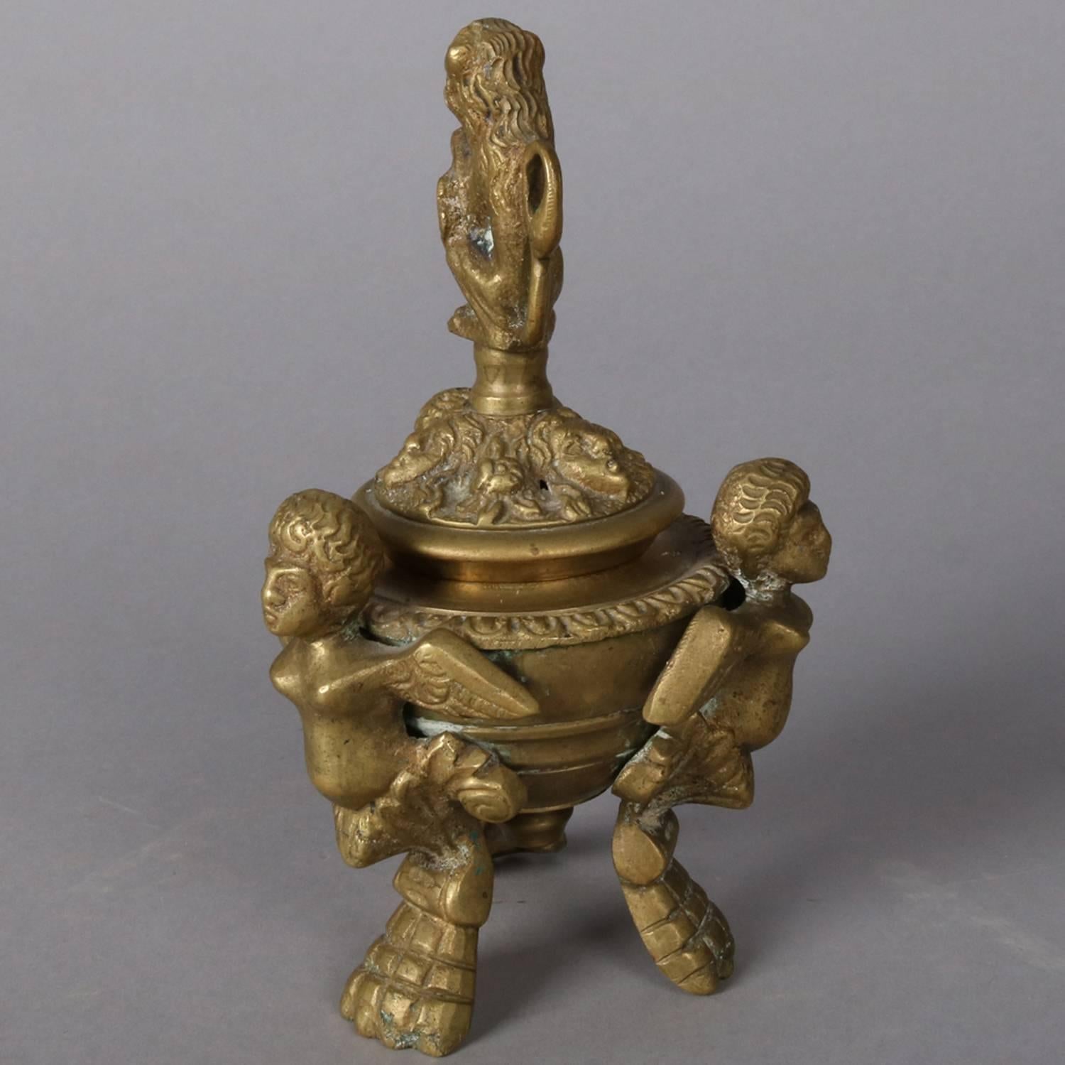 Italian Baroque figural cast brass censor features lion finial and seated on three Chimera form legs, single hole in lid, signed 