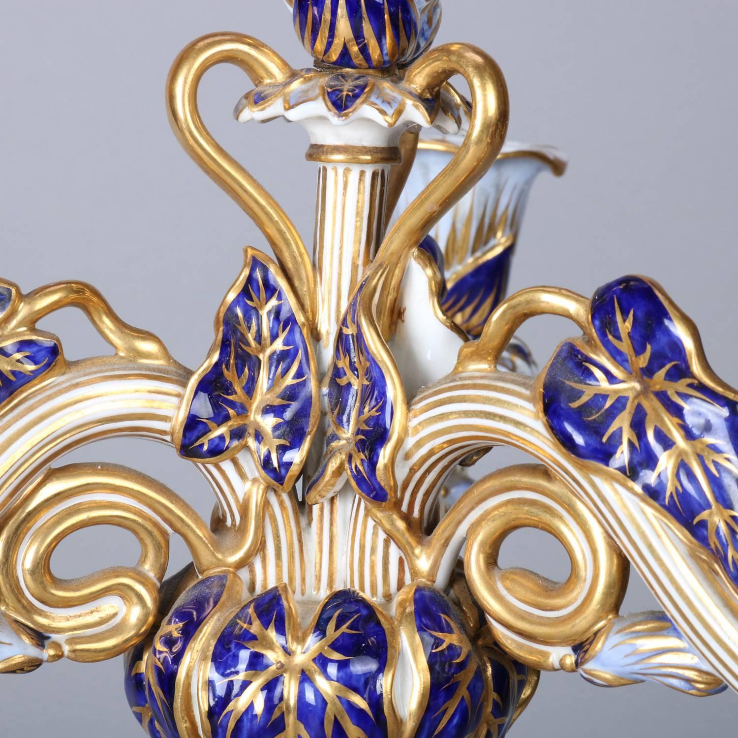 Pair of Meissen School Cobalt & Gilt Porcelain Cherub & Foliate Form Candelabra 1