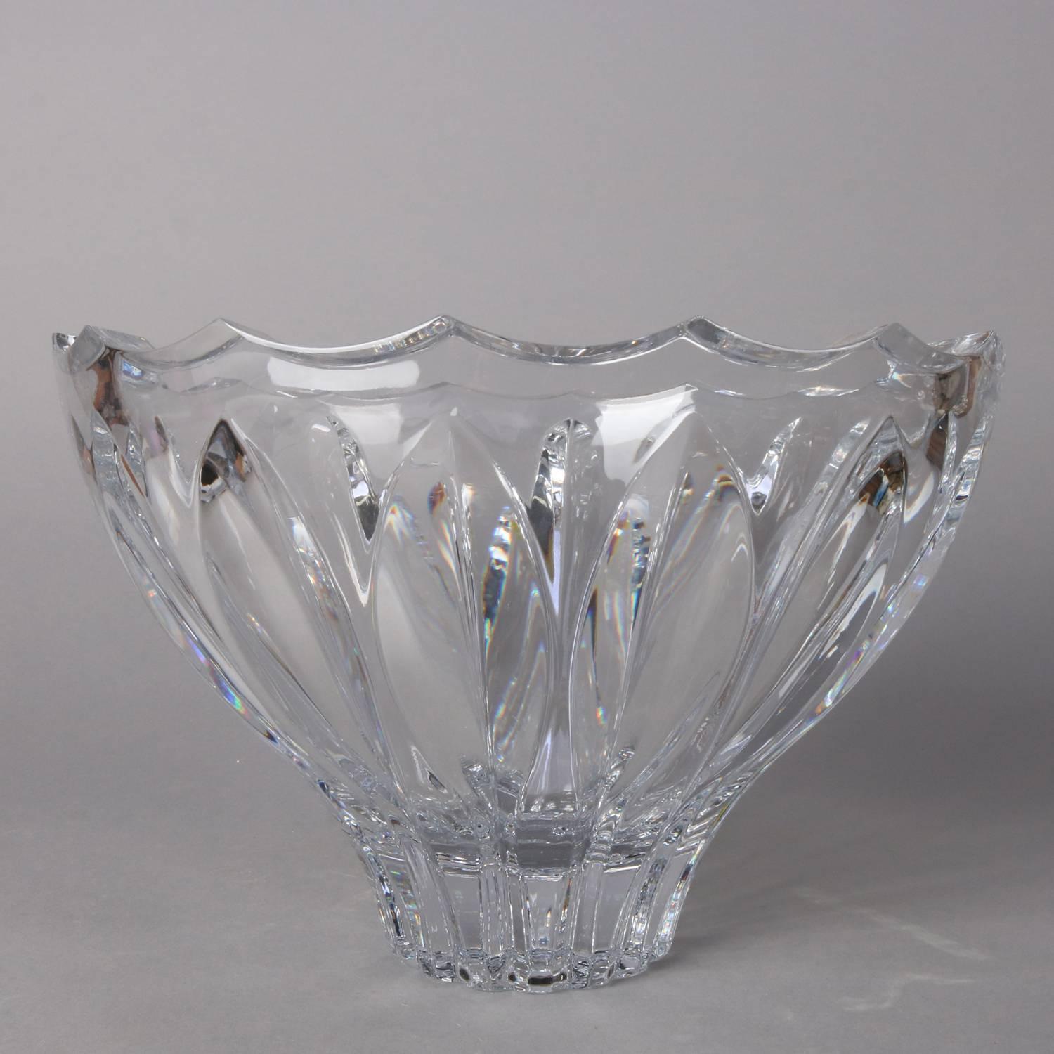 Contemporary Baccarat School heavy crystal vase features tulip form with stylized leaf pattern and scalloped rim, 20th century

Measures: 7