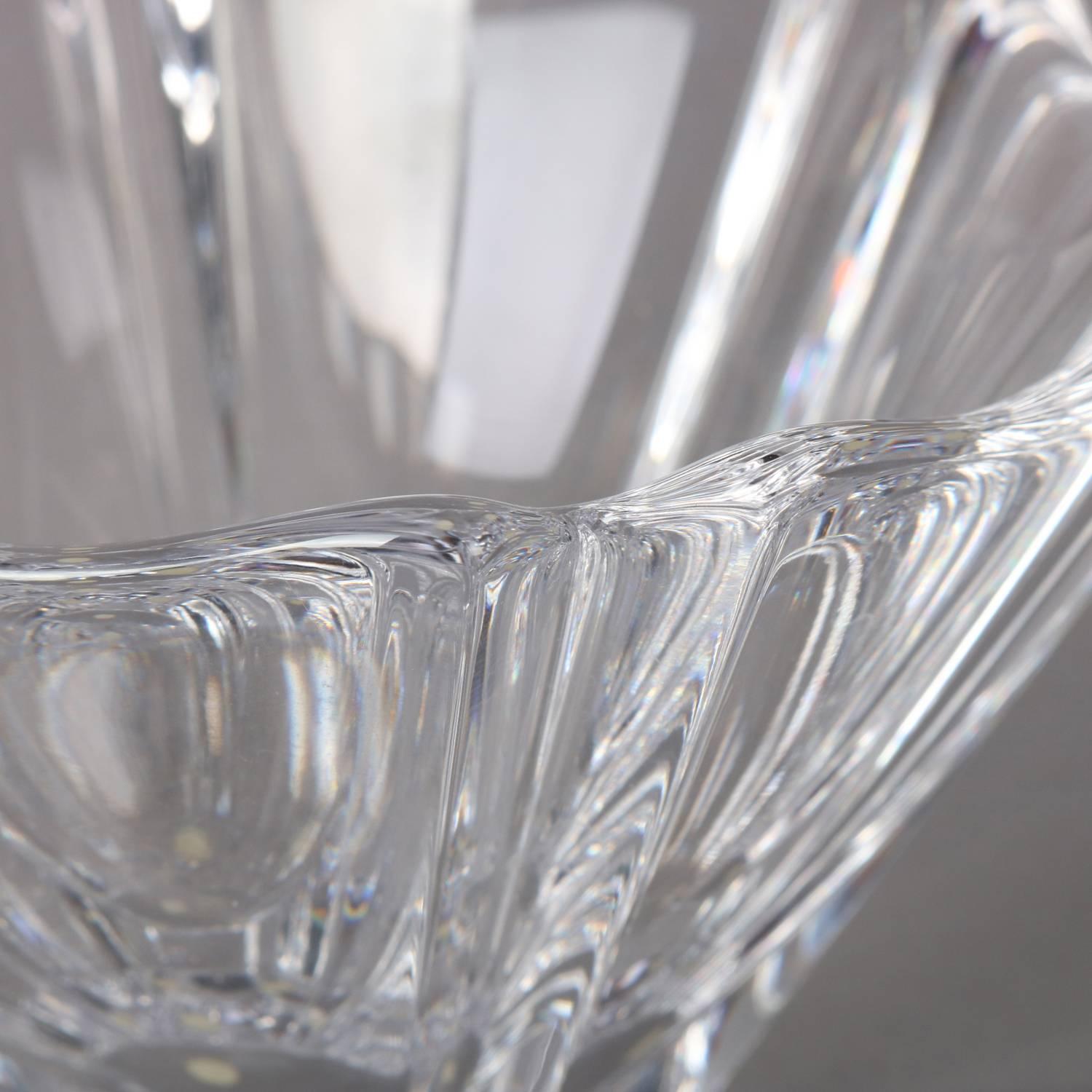 Swedish crystal Orion bowl designed for Orrefors by sculptor Lars Hellsten features flared form with scalloped edge, signed at base, 20th century

Measures: 3.5