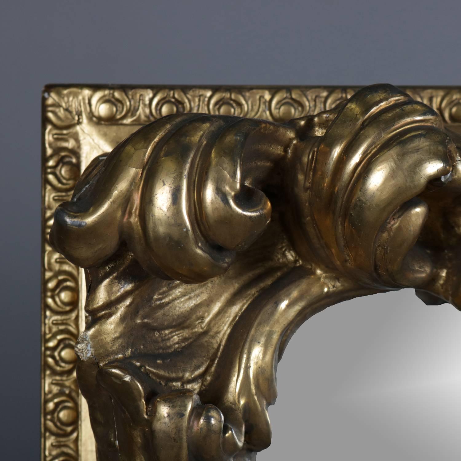 Antique foliate wall mirror features first finish gilt on high relief foliate form gesso and wood frame, 19th century

***DELIVERY NOTICE – Due to COVID-19 we are employing NO-CONTACT PRACTICES in the transfer of purchased items.  Additionally, for